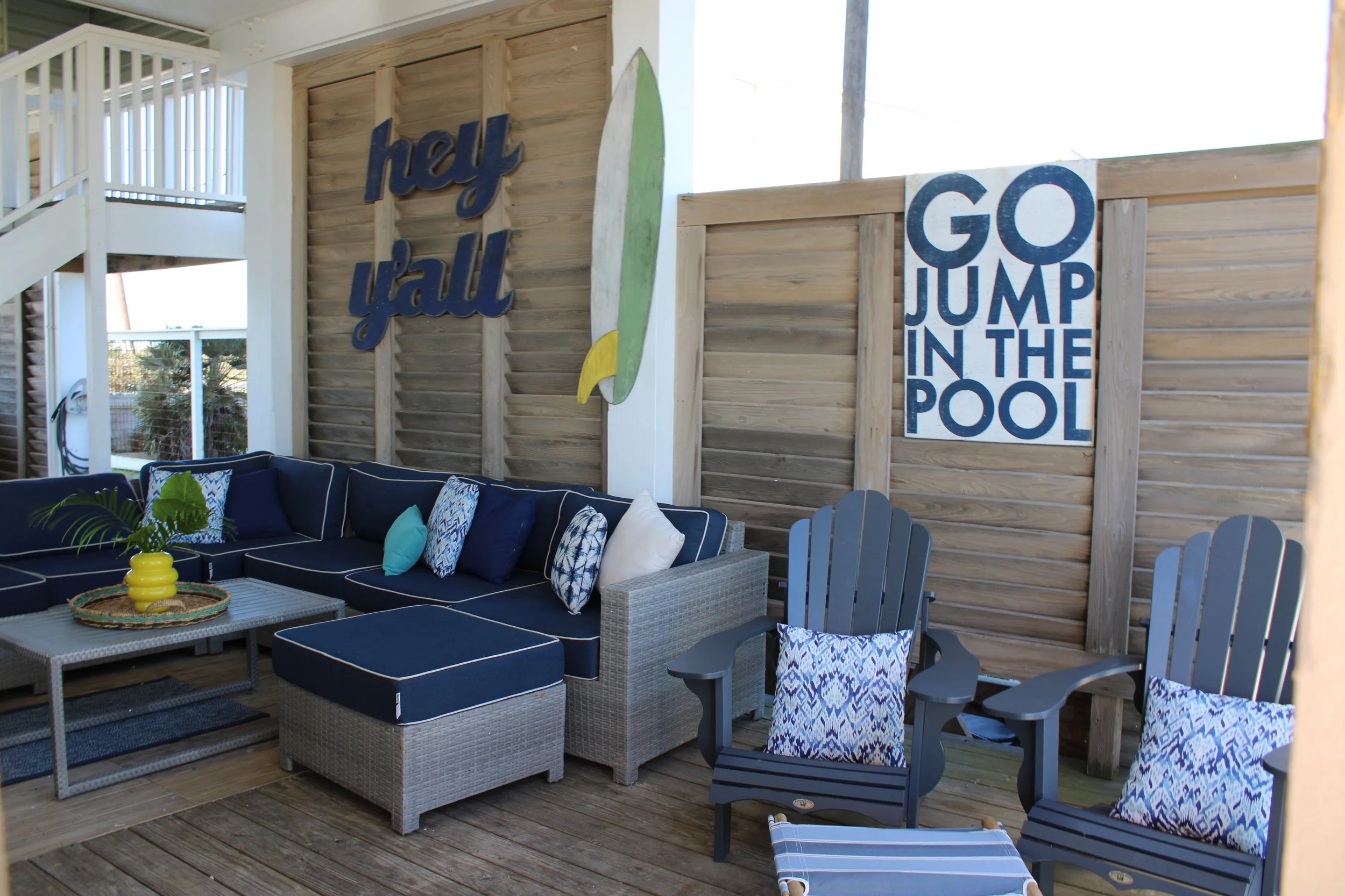 Take a break from the sun under the deck’s shade with comfortable Sunbrella deck furniture.