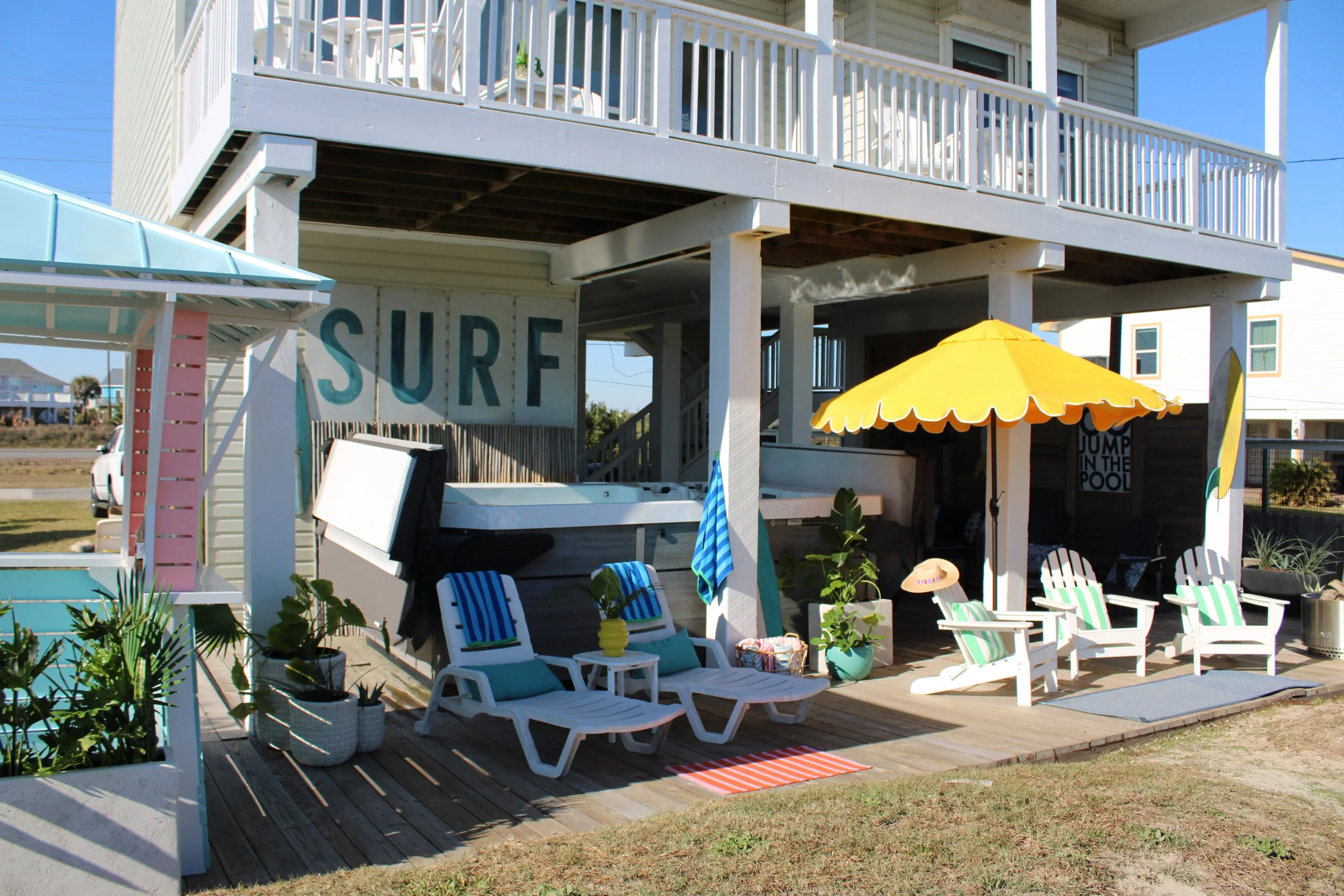 Enjoy your time with the family and friends in the shade of the covered deck. There is plenty of space to relax in the Adirondack chairs around a campfire, play a game of corn hole, or prepare a BBQ picnic on the charcoal grill. Summer is around the 