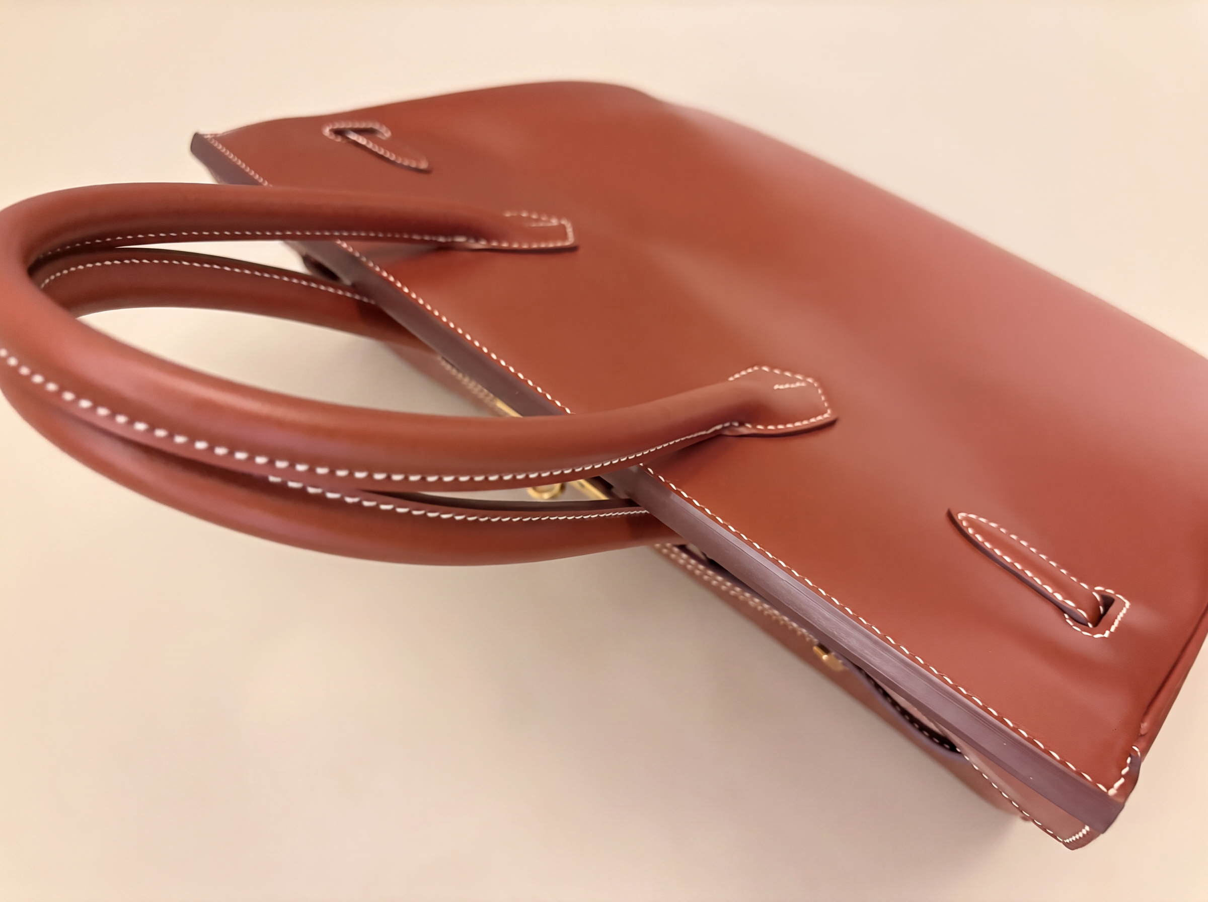 Luxury Handbag Stitching Detail.png