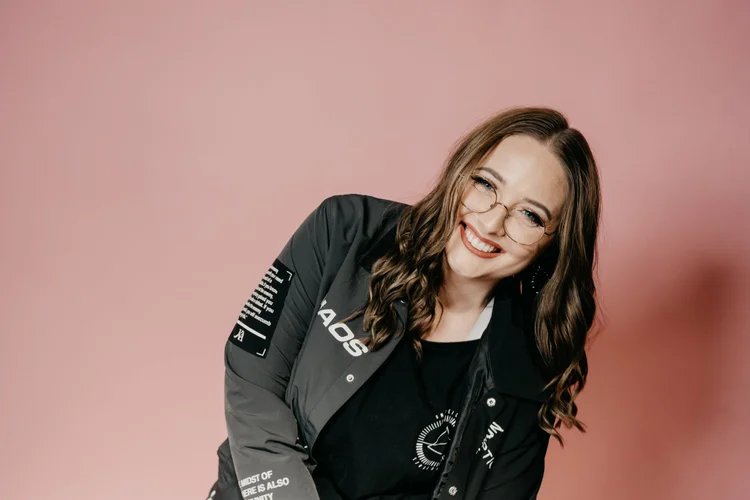 Paris Le Maistre, host of the Sh*ts F*cked podcast, smiling