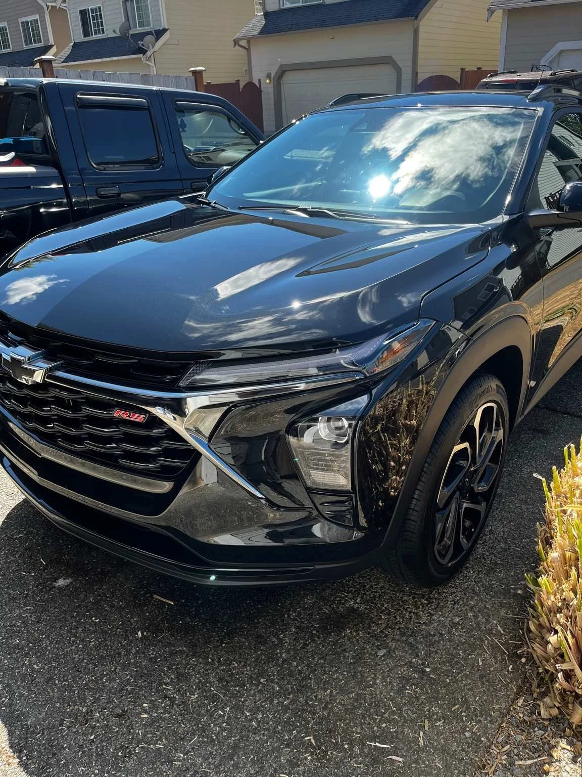 Chevrolet Blazer RS wash and wax detailing by BryanzAutoDetailing - glossy black paint finish