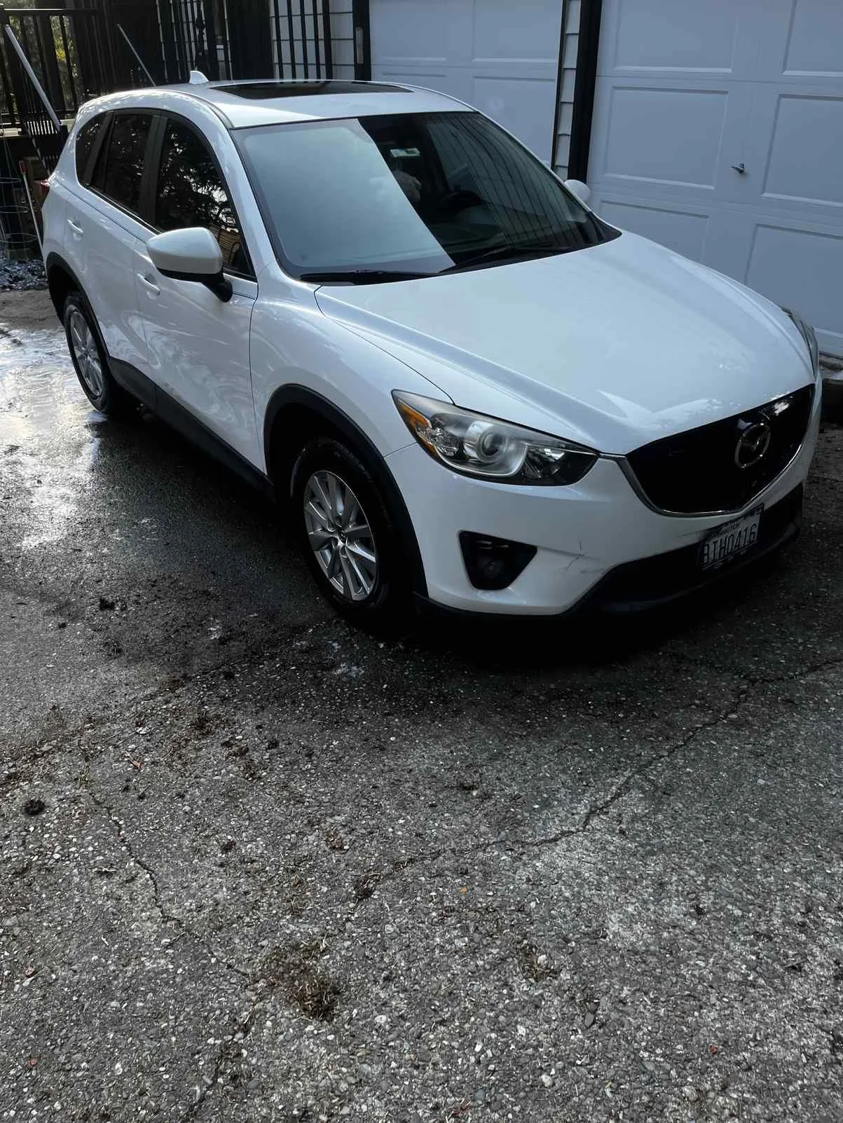 Auburn SUV detailing with clean white Mazda CX-5 and polished exterior