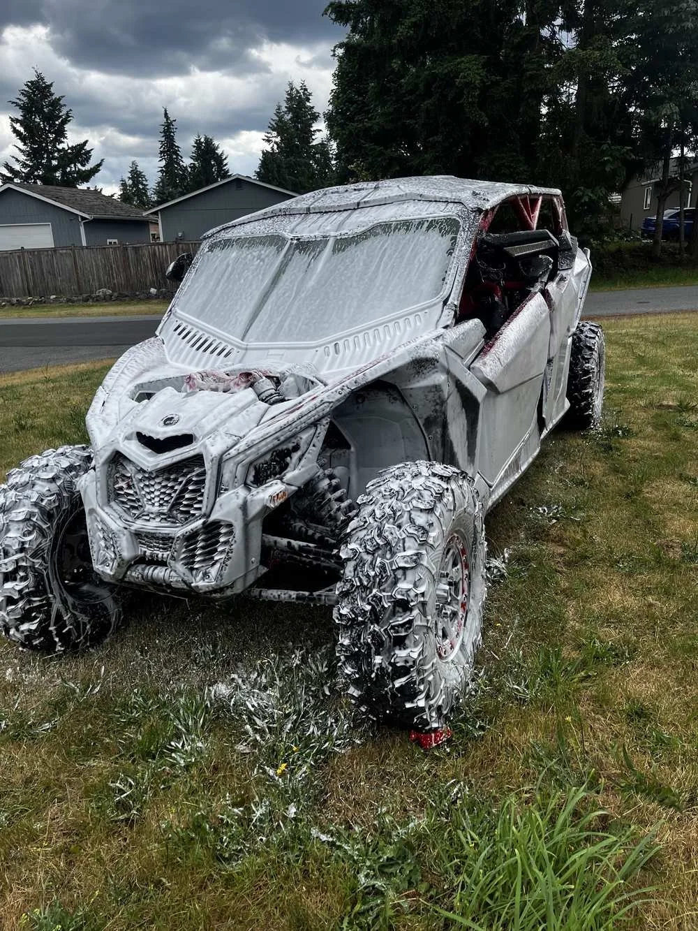 ATV covered in foam during a professional detailing wash in Shoreline, Washington - off-road vehicle detailing by Bryanz Auto Detailing.