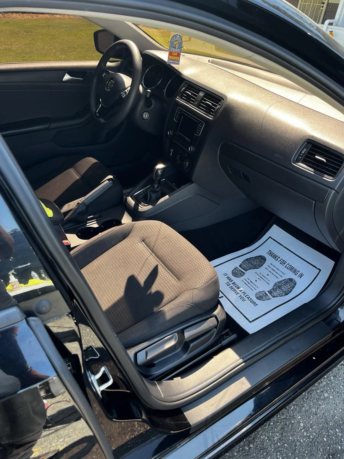 Clean Volkswagen front interior after mobile detailing in Tacoma, WA by Bryanz Auto Detailing