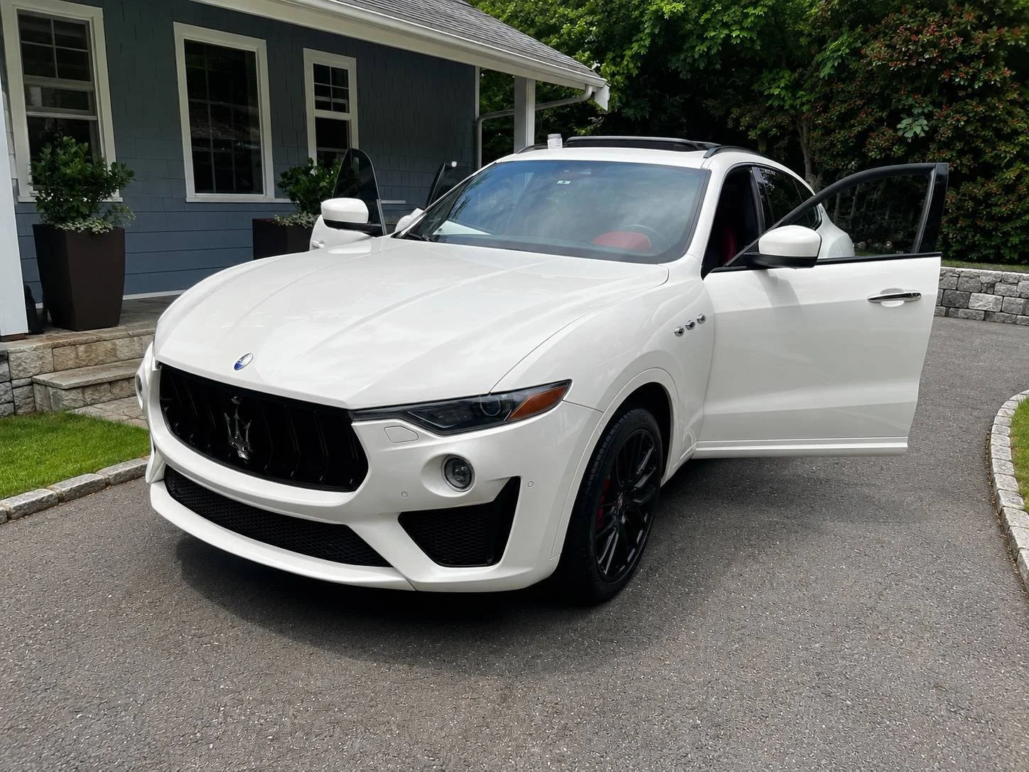 Maserati Levante after professional exterior detailing with glossy white paint and luxury SUV mobile detailing by Bryanz Auto Detailing