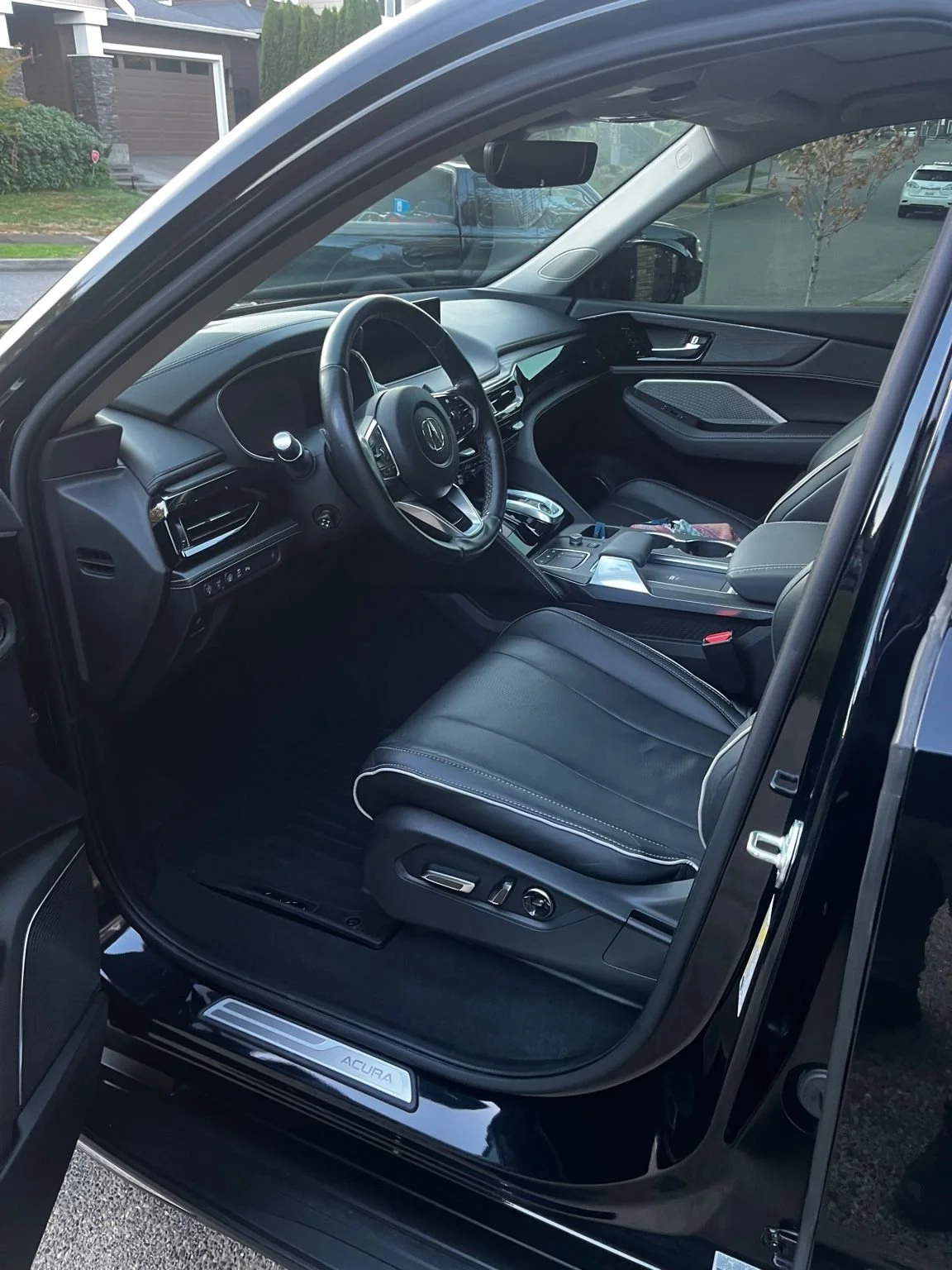 Acura MDX interior detailing with deep cleaned leather seats, restored dashboard, and a fully refreshed front cabin.