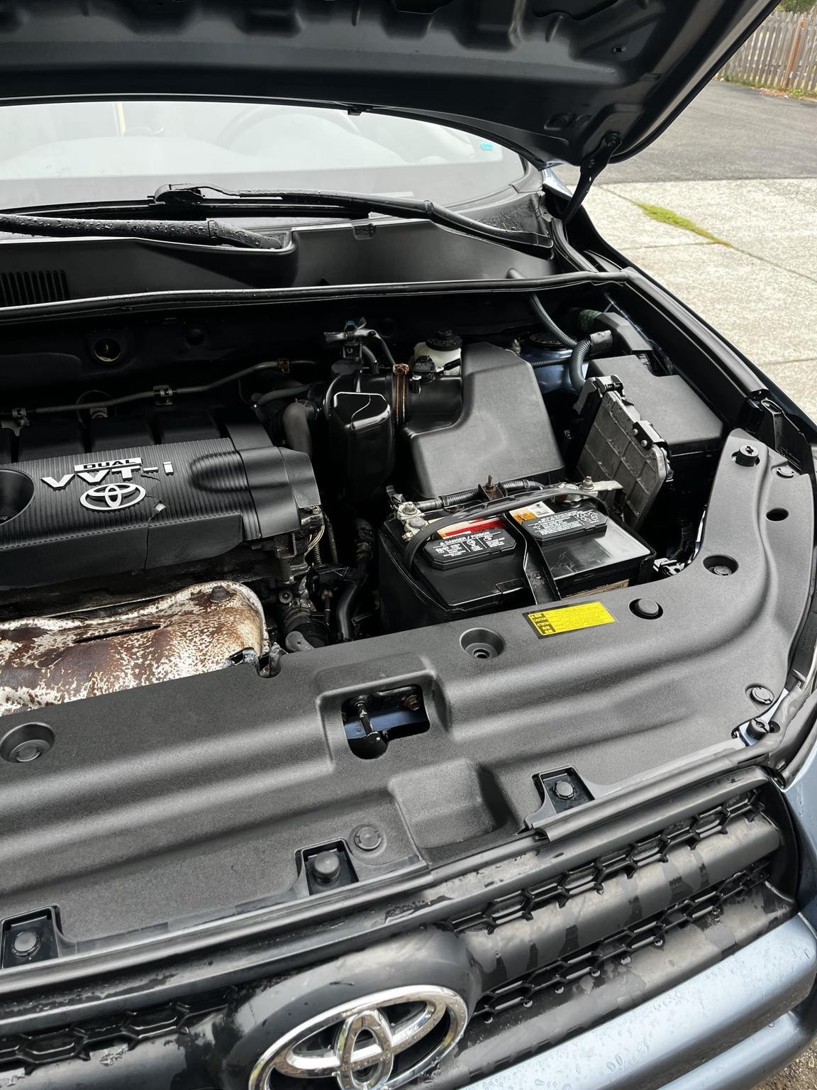 Detailed Toyota engine bay showing professionally cleaned components by Bryanz Auto Detailing in Tacoma, WA