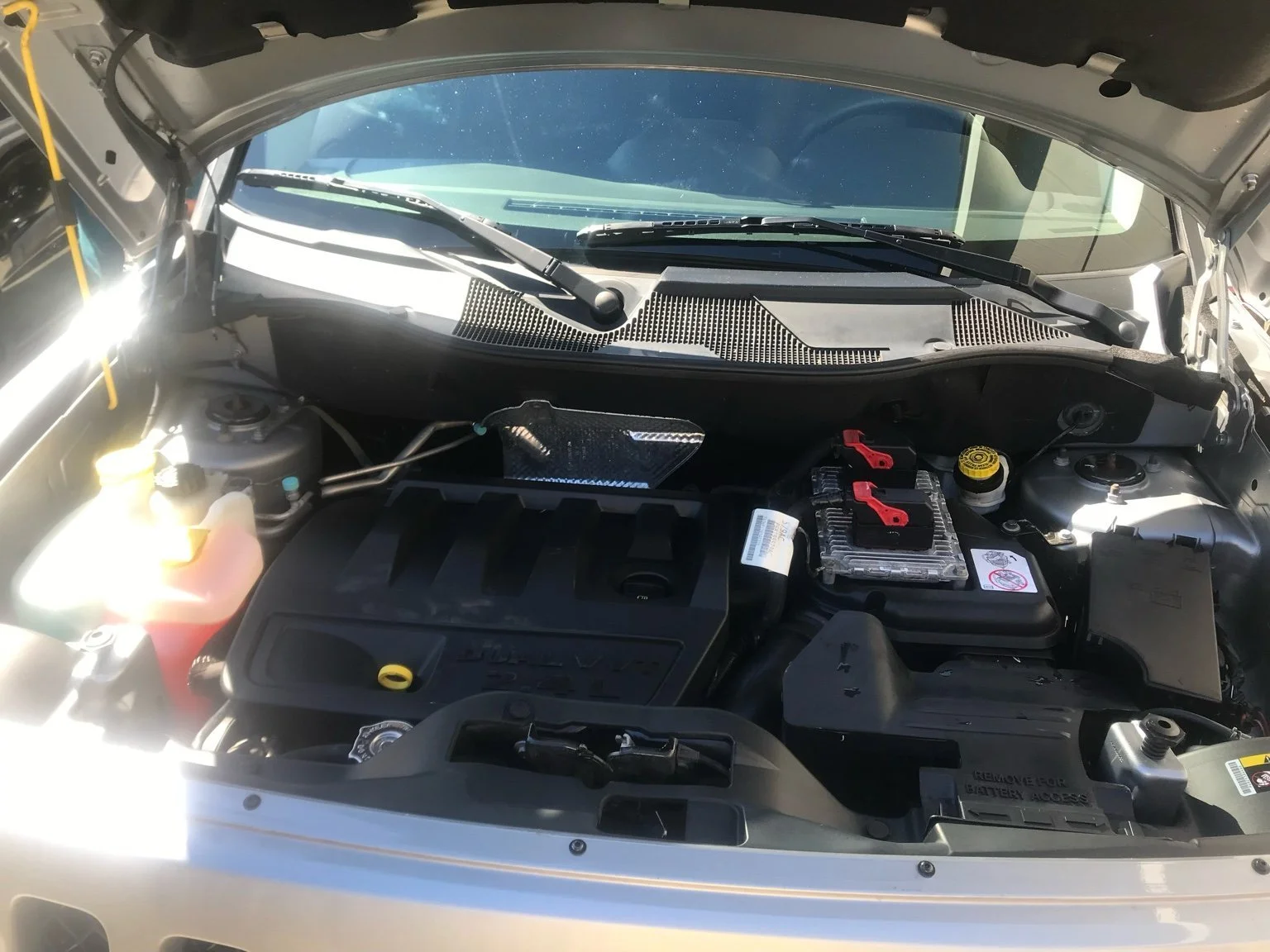 Jeep engine bay after professional cleaning - degreased, detailed, and restored by BryanzAutoDetaliing.