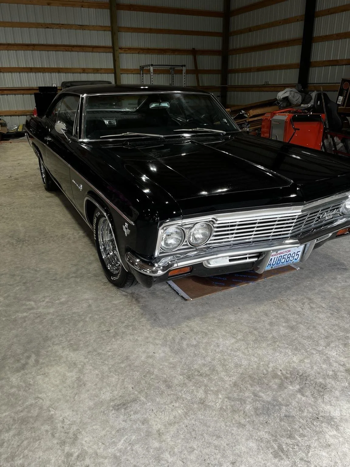 Black classic Chevrolet with a deep glossy finish after professional paint correction by Bryanz Auto Detailing.