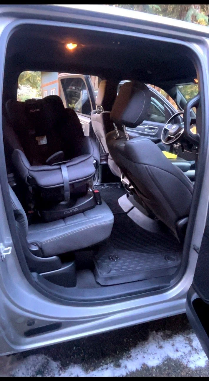 Ram truck rear interior detailing with deep cleaned seats, floor, and car seat after mobile detailing in Maple Valley WA