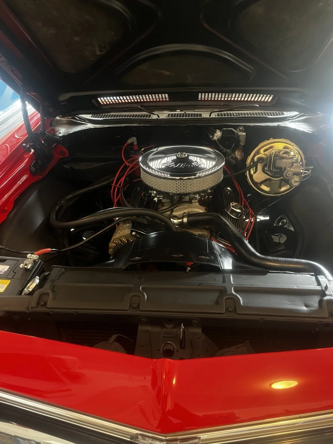 Professional engine bay detailing on a classic Chevrolet in Bonney Lake, WA by Bryanz Auto Detailing.