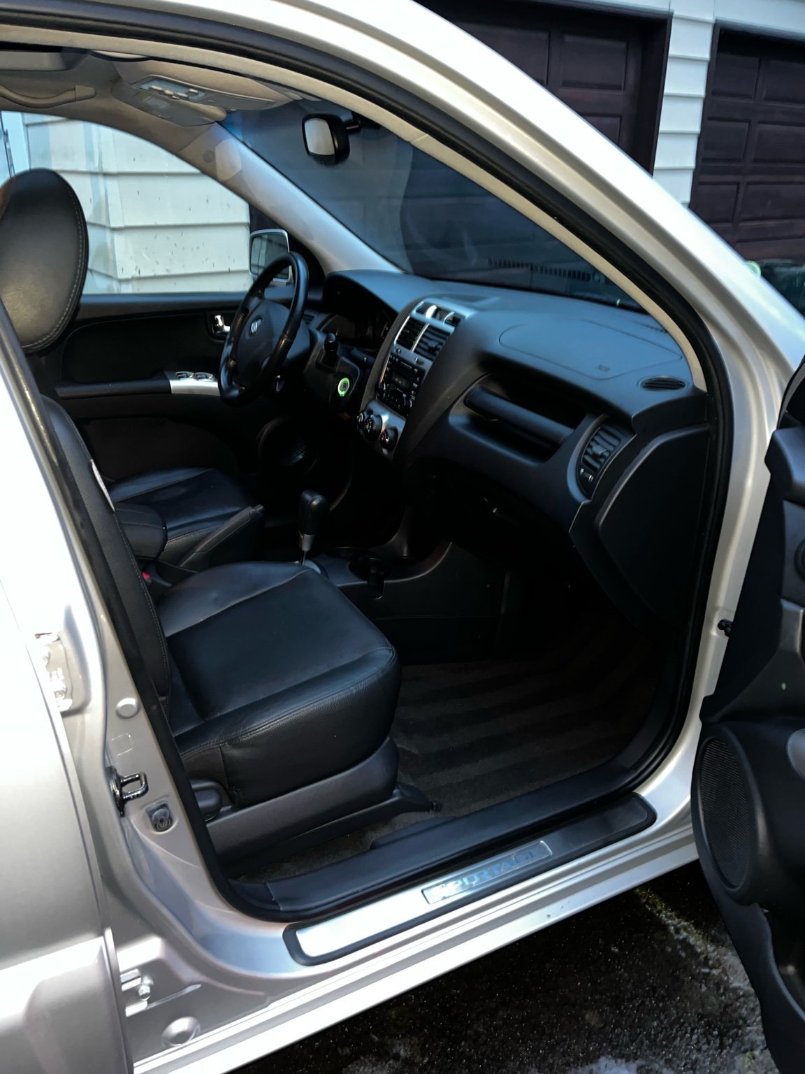 After restorative interior cleaning on Kia Sportage interior showing fully restored seats, dashboard, and flooring after deep interior detailing service.