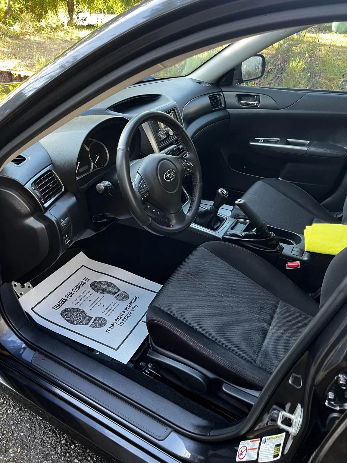 Subaru WRX interior after professional detailing and pet hair removal in Tacoma, WA