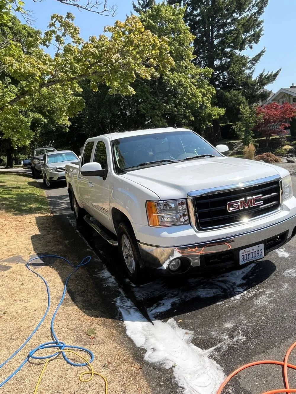 GMC truck during professional mobile wash and foam detail in Kent, WA