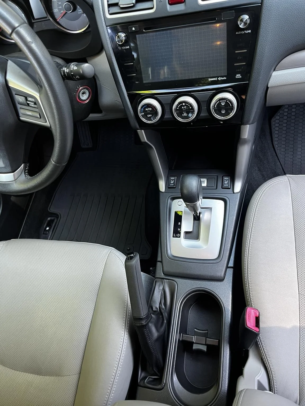 Professional Subaru interior detailing and center console cleaning by Bryanz Auto Detailing near Gig Harbor WA