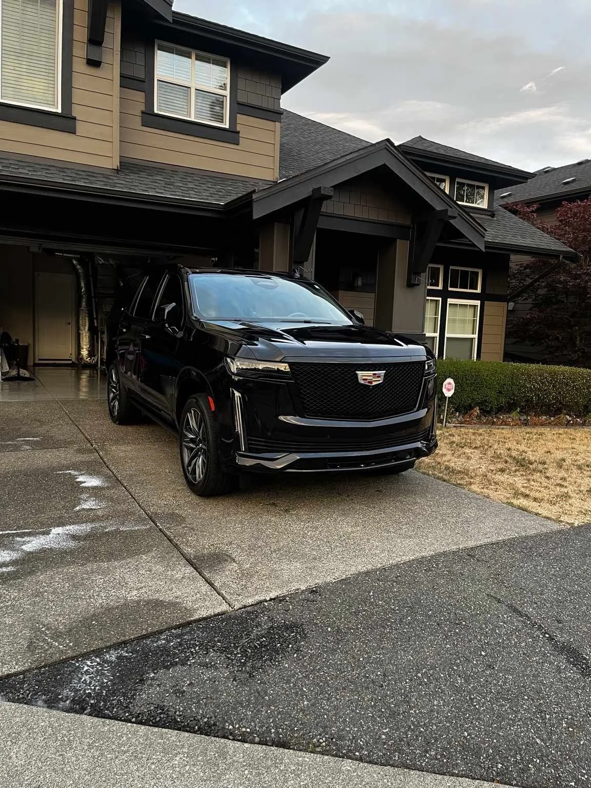 Cadillac Escalade wash and wax service in Renton WA by Bryanz Auto Detailing showing deep gloss shine and professional exterior detailing