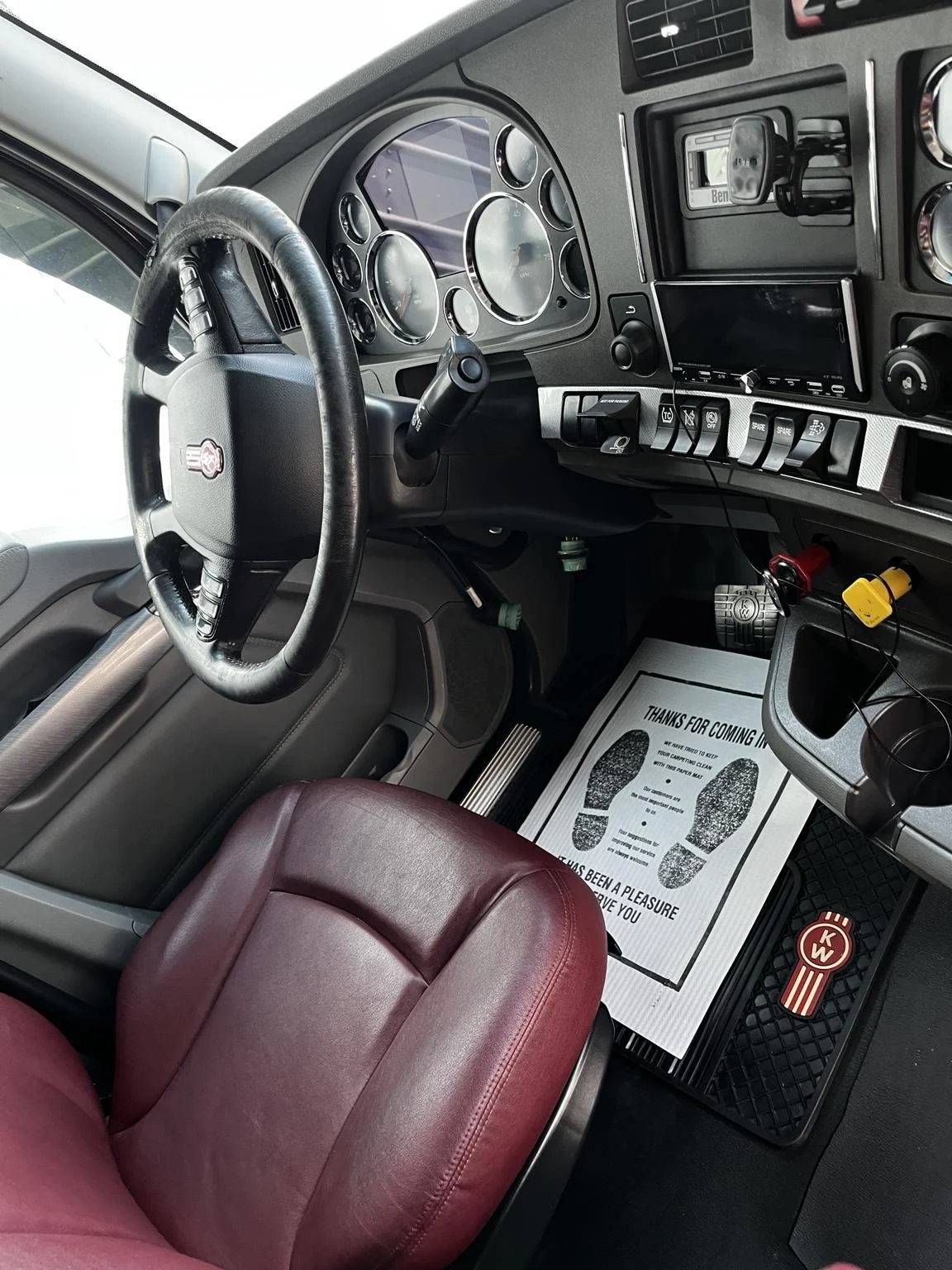 Auburn WA Kenworth semi truck interior detailing with red leather seats by Bryanz Auto Detailing