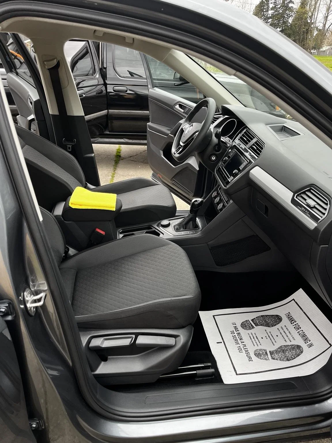 Volkswagon interior detailing service in Renton WA by Bryanz Auto detailing showing deep cleaned seats dashboard and center console.