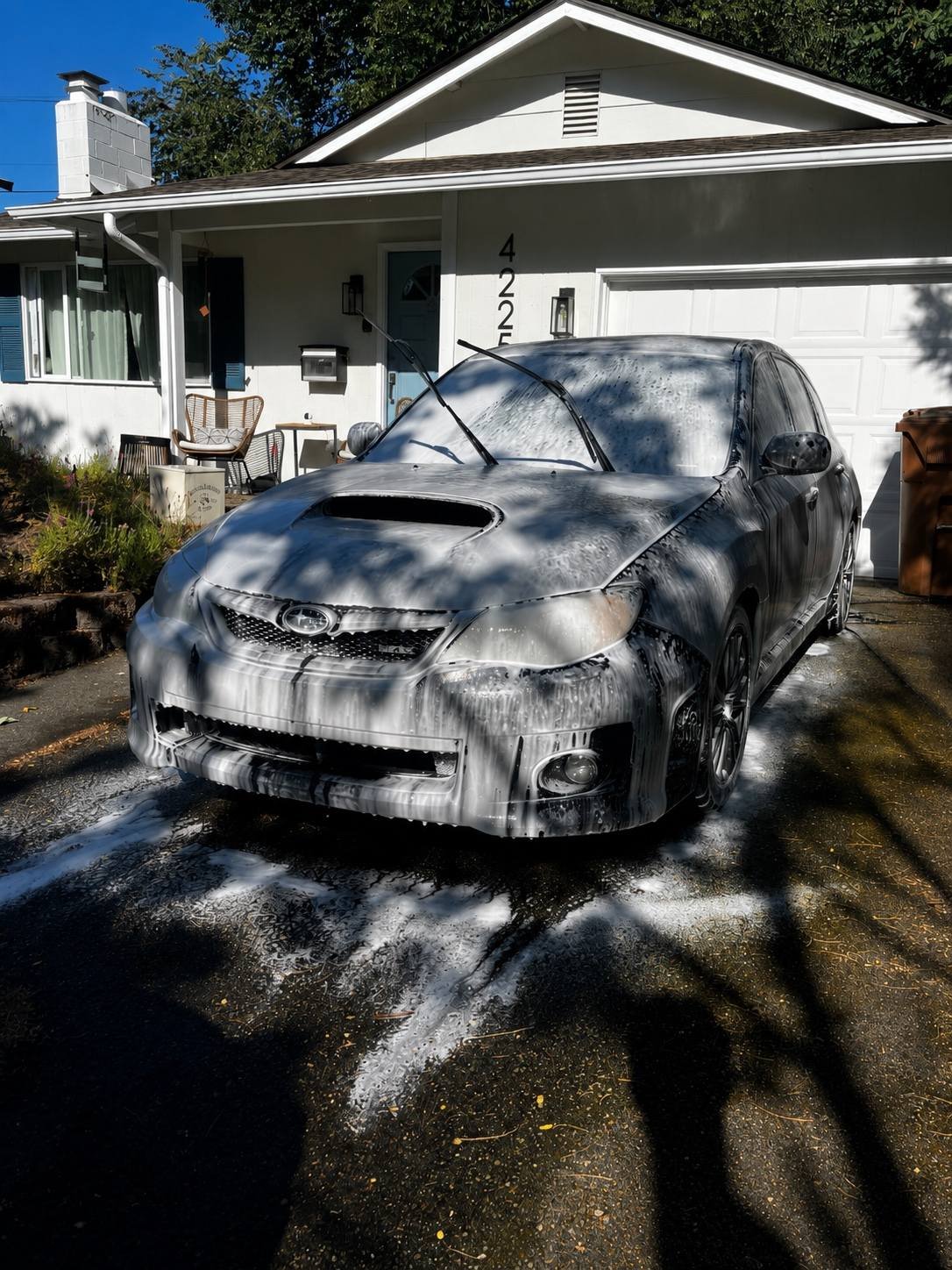 Subaru WRX recieving a professional foam wash  during mobile auto detailing in Tacoma, WA