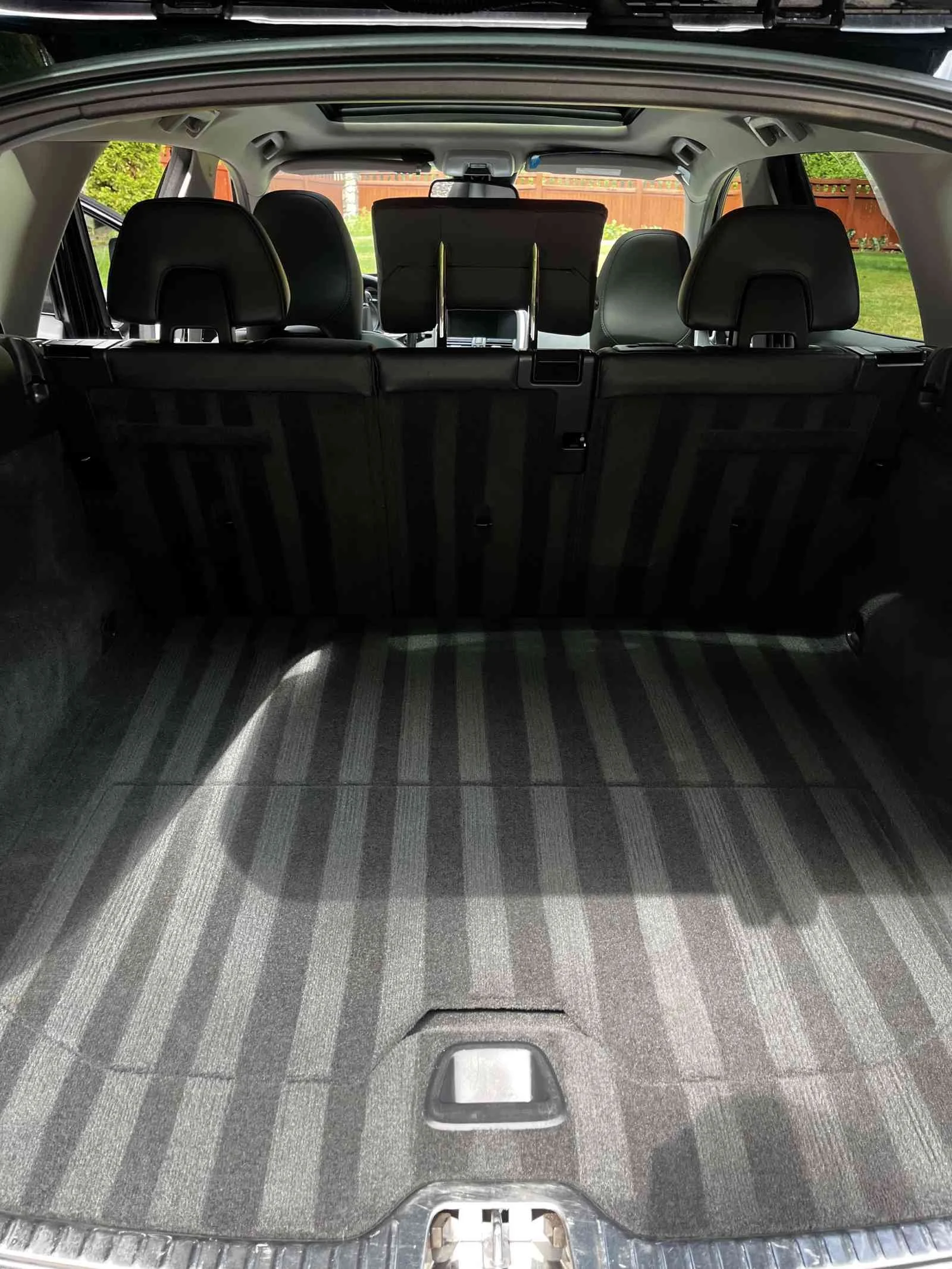 Trunk interior after mobile detailing in Federal Way - deep cleaned with professional vacuum lines