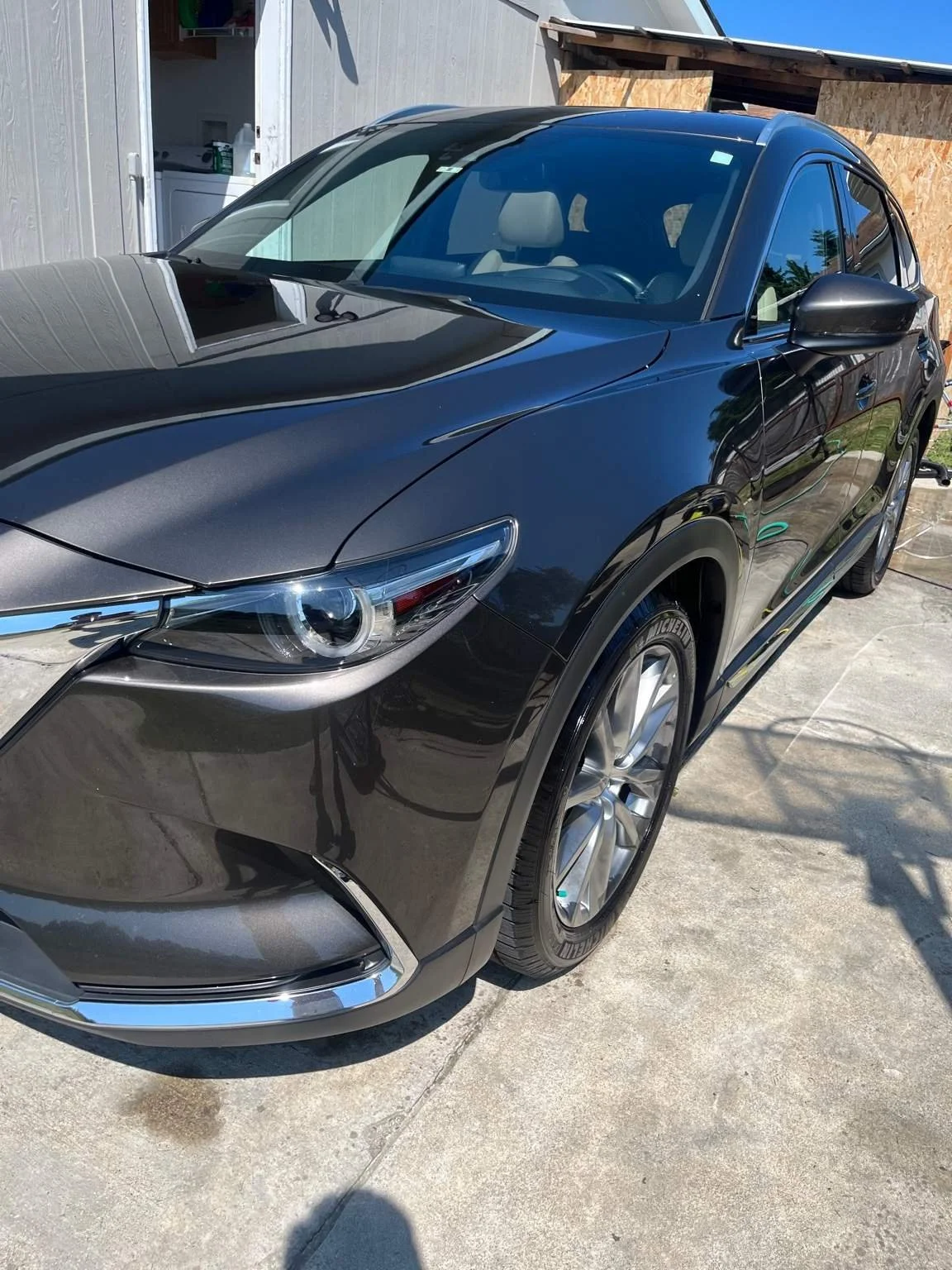 Mazda CX-9 after full paint correction - deep reflection and flawless finish restored by Bryanz Auto Detailing.