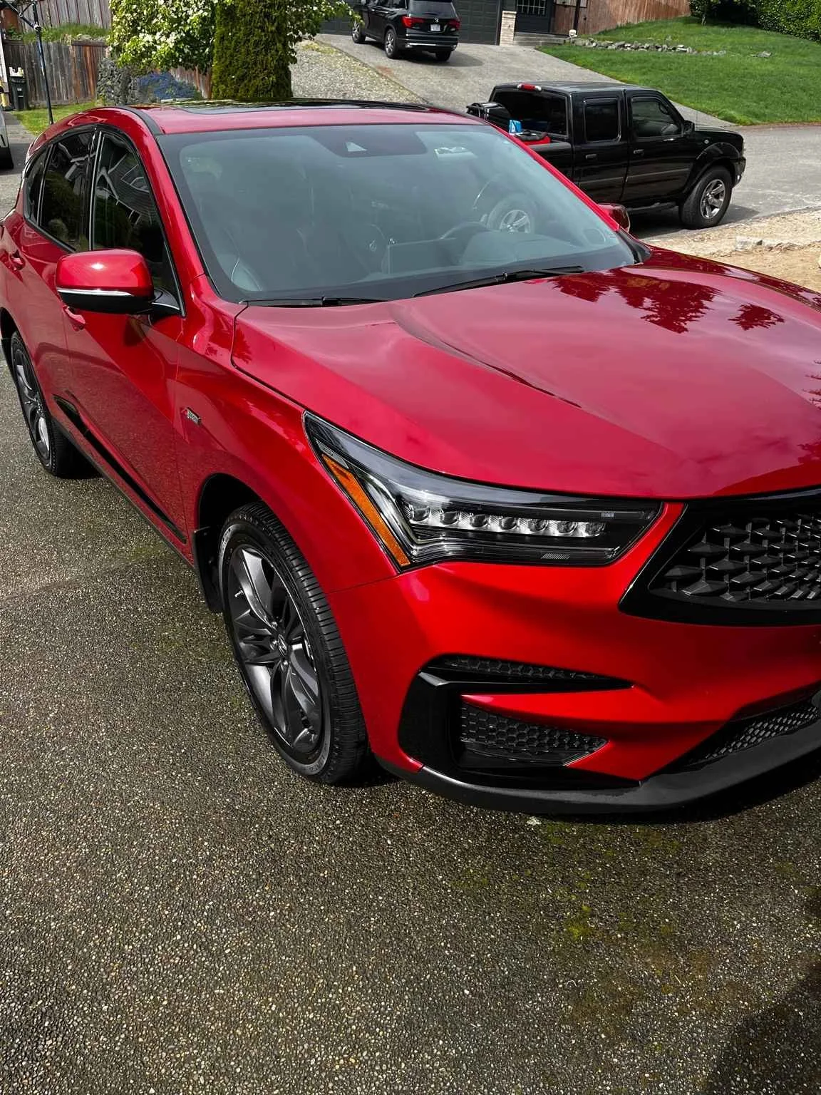 BryanzAutoDetailing wash and wax on red Acura RDX A-spec - premium exterior detailing results.