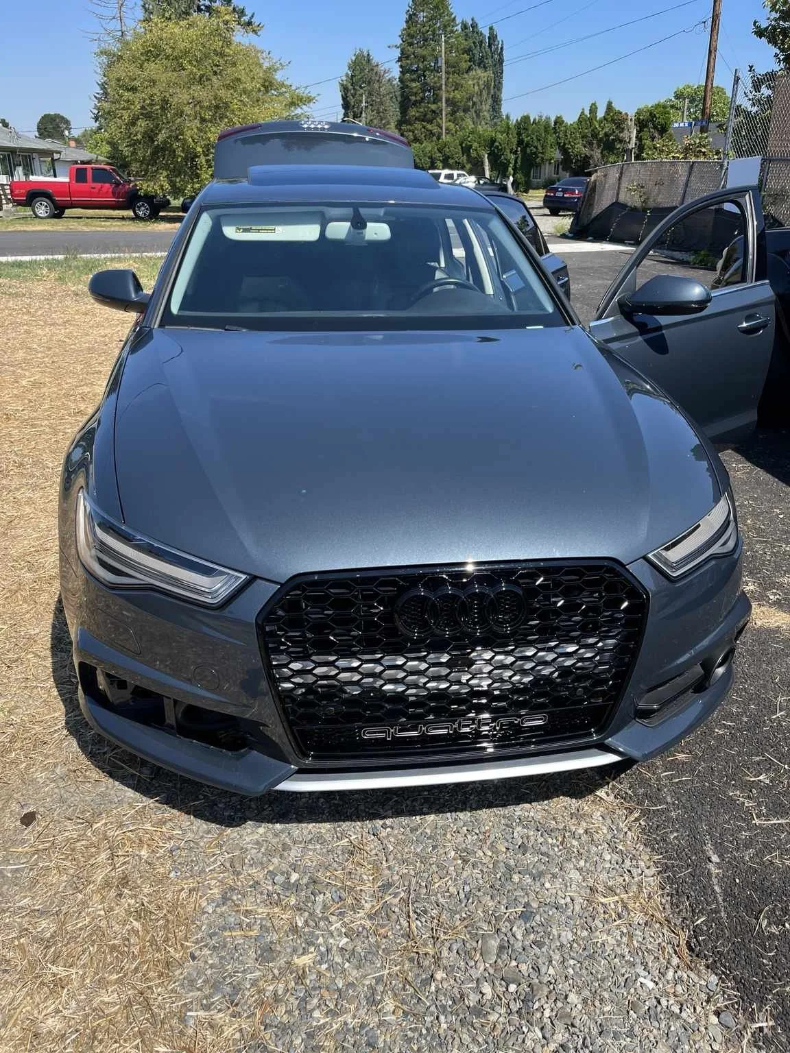 Professional exterior wash completed on Audi Quattro sedan.