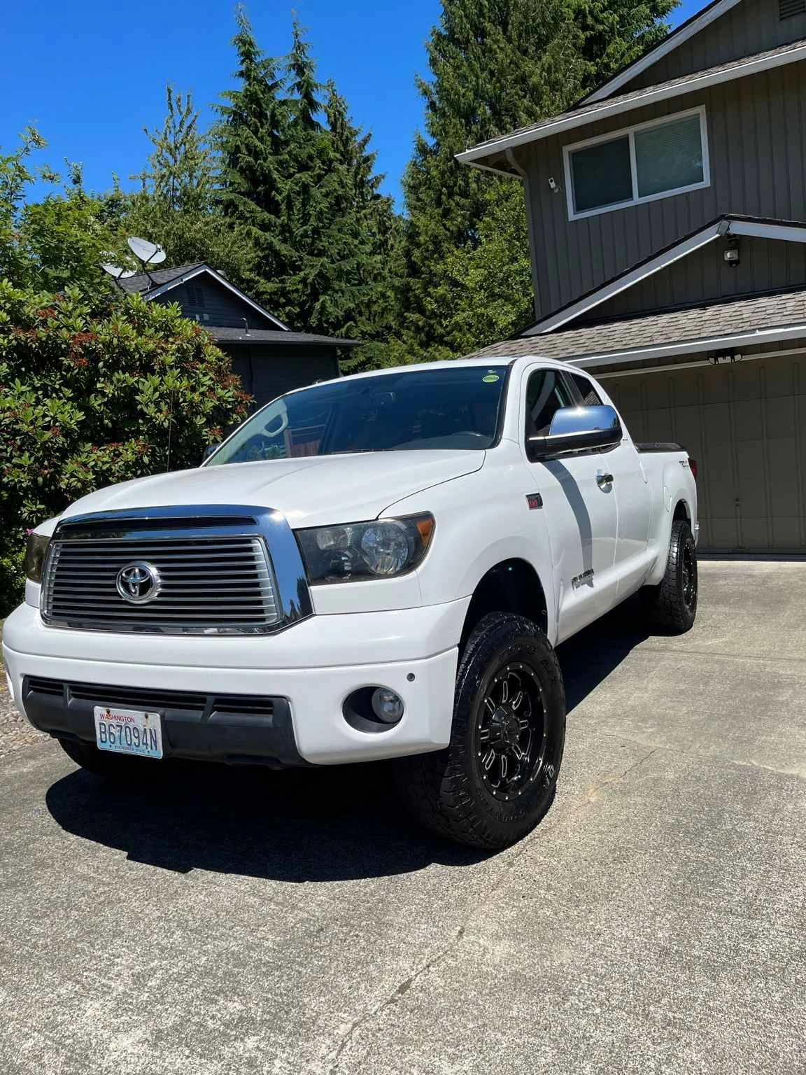 White Toyota Tundra after professional paint correction and polishing by Bryanz Auto Detailing in Washington.