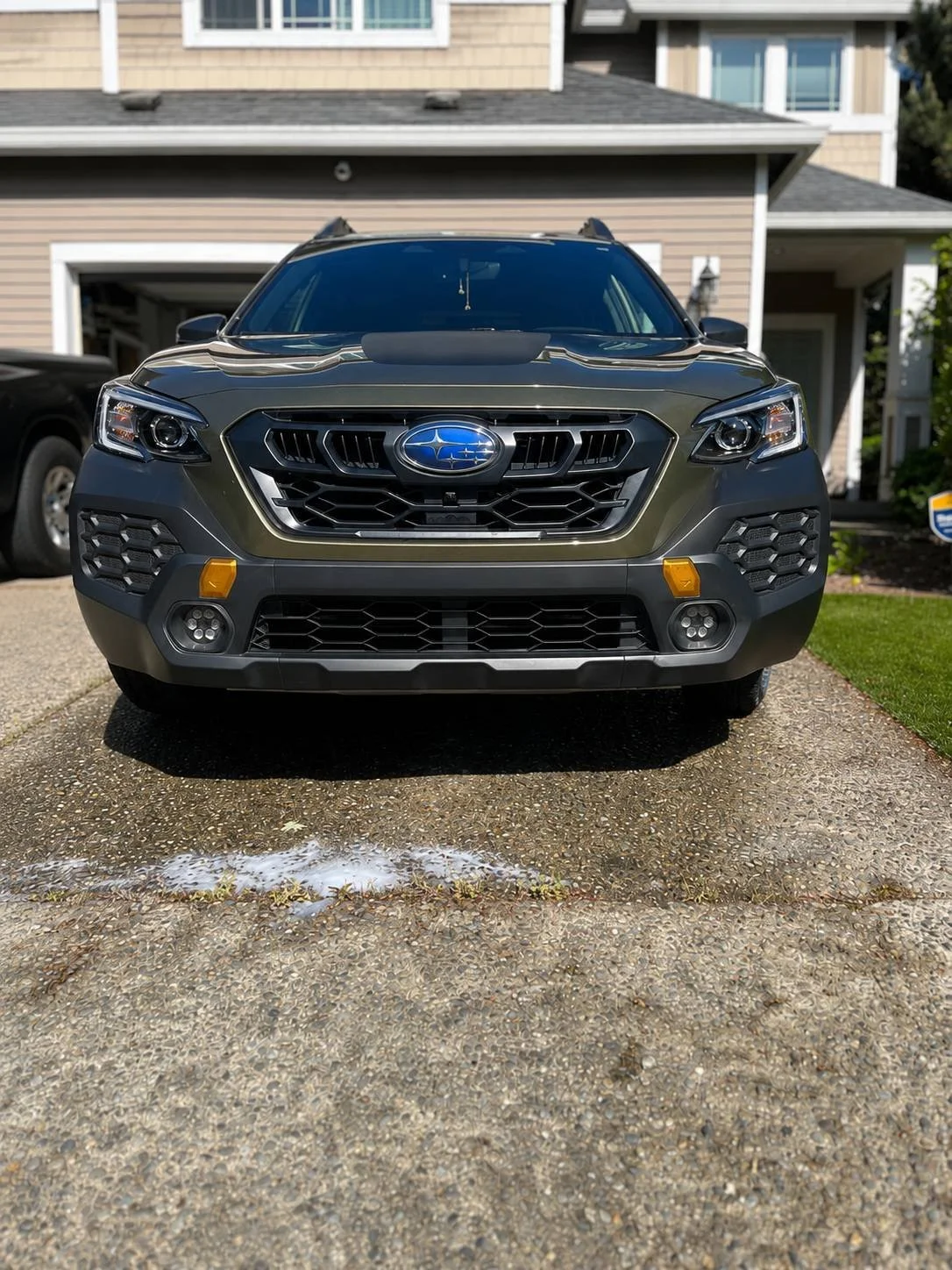 Front view of Subaru Outback after exterior wash and wax mobile detailing service in Maple Valley WA by Bryanz Auto Detailing featuring paint gloss enhancement, exterior shine, SUV detailing, and professional mobile auto detailing.