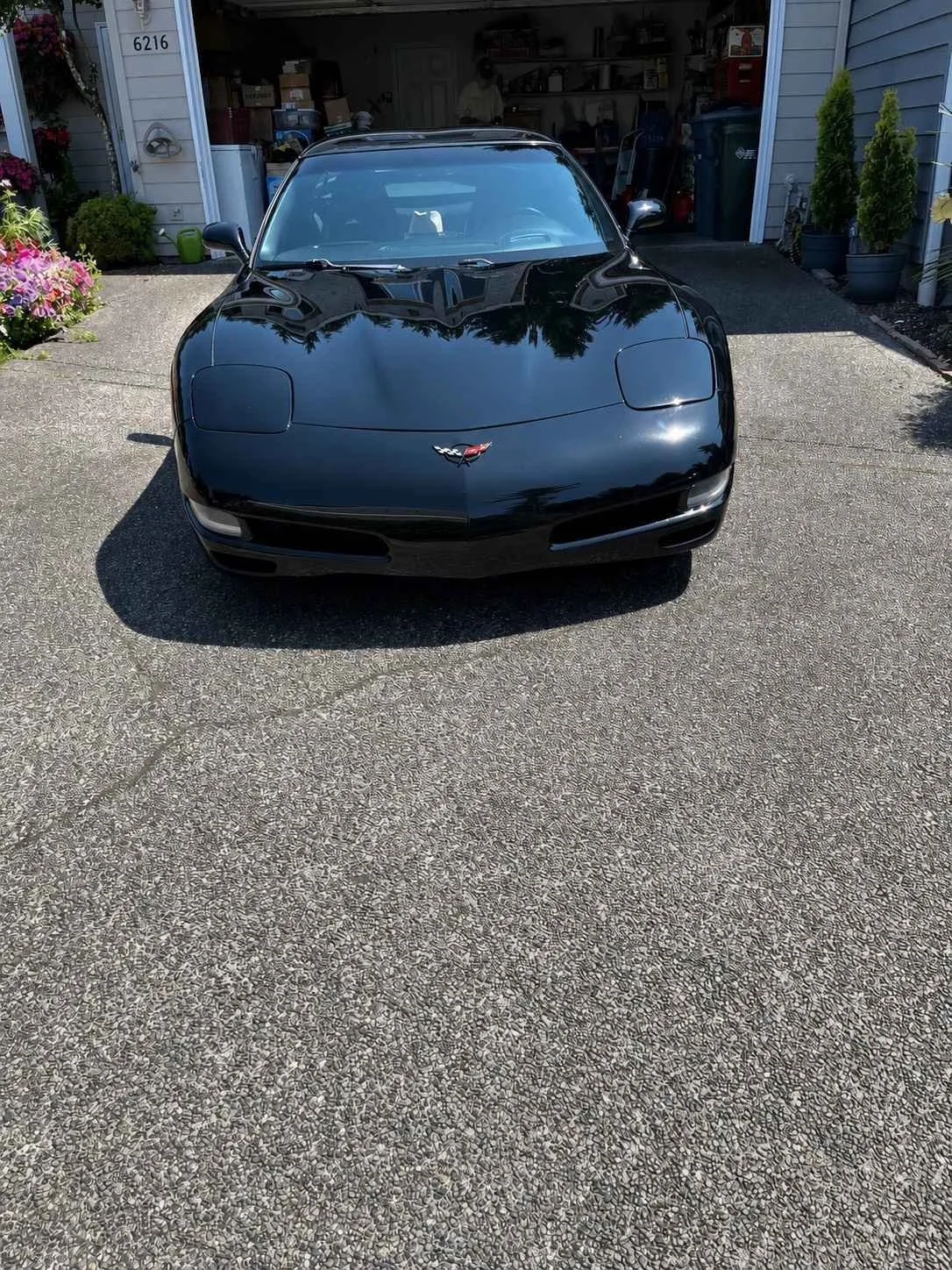 black Chevrolet Corvette mobile detailing with deep paint shine by Bryanz Auto Detailing in Gig Harbor WA