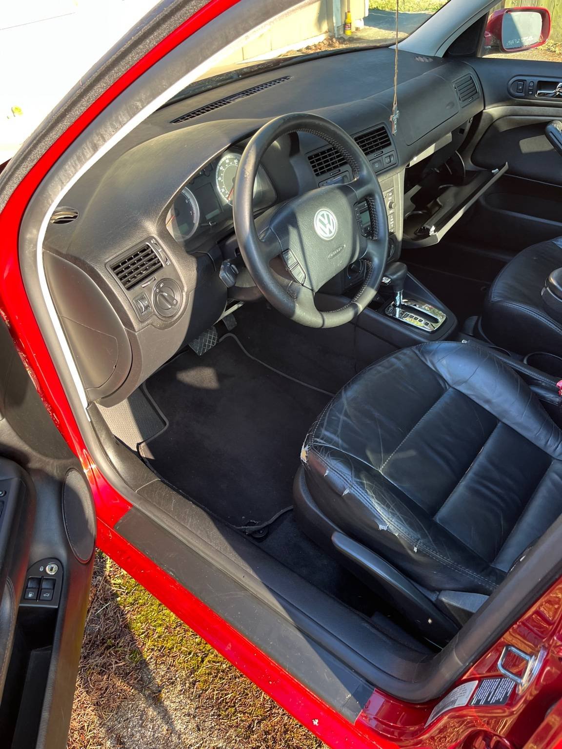 After restorative interior cleaning on Volkswagen interior showing deep cleaned dashboard, carpets, and seats fully restored from heavy dirt and grime.