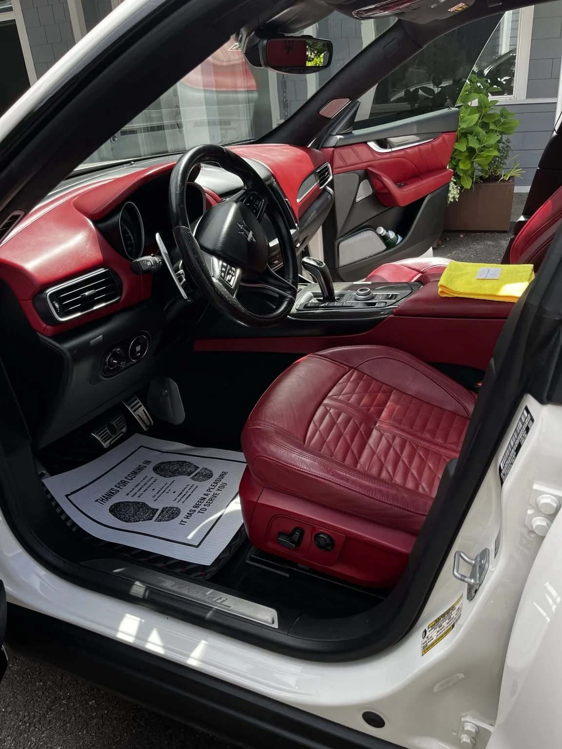 Luxury Maserati interior detailing with red leather seat cleaning by Bryanz Auto Detailing near Gig Harbor WA