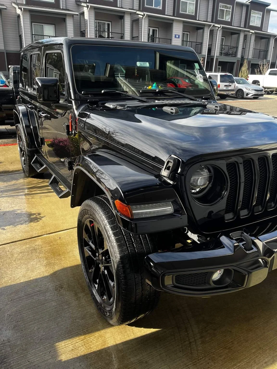Jeep Wrangler exterior mobile detailing service completed in Bonney Lake WA with deep gloss finish.
