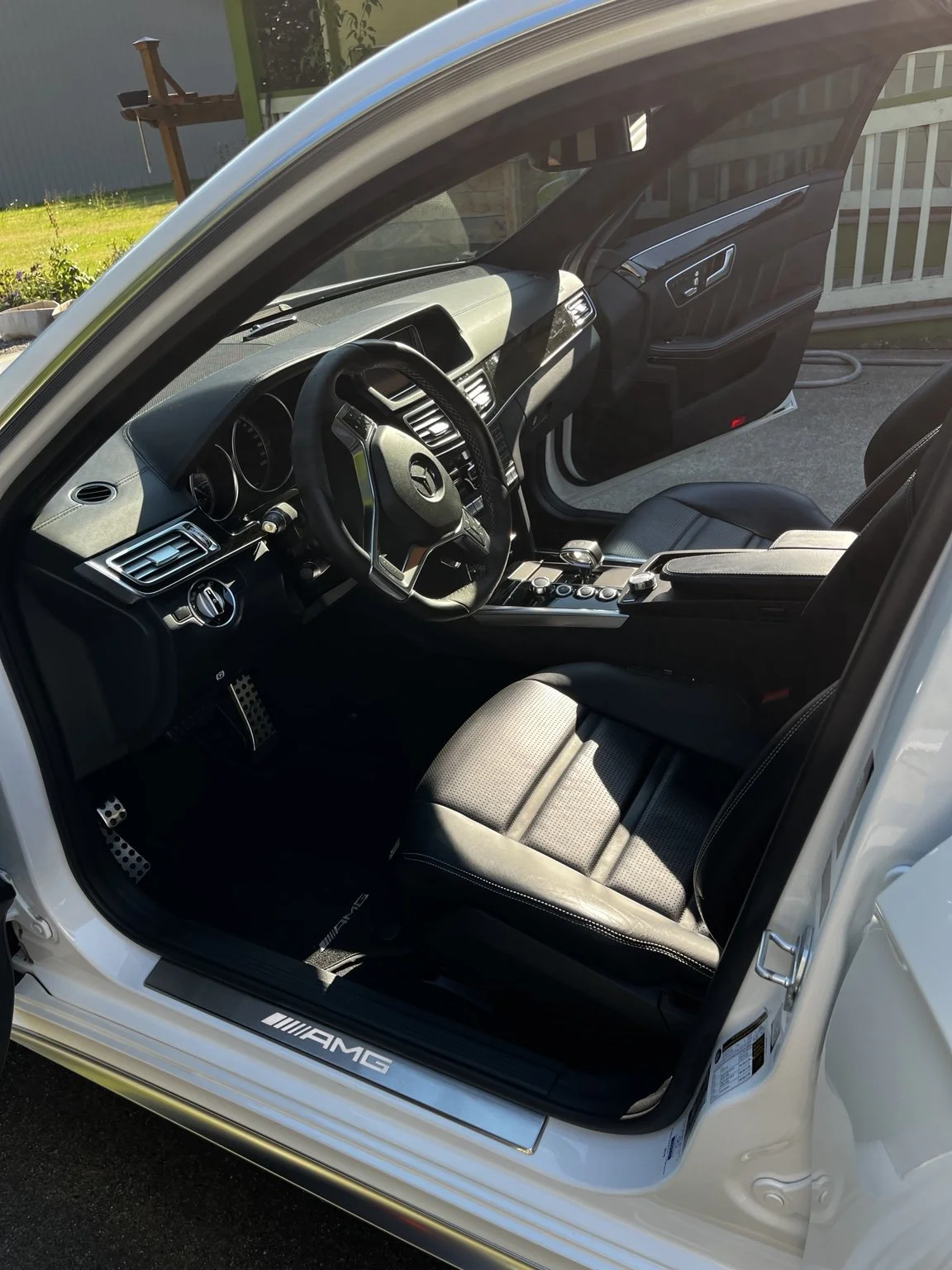 Clean Mercedes-Benz AMG black leather interior after professional detailing by Bryanz Auto Detailing
