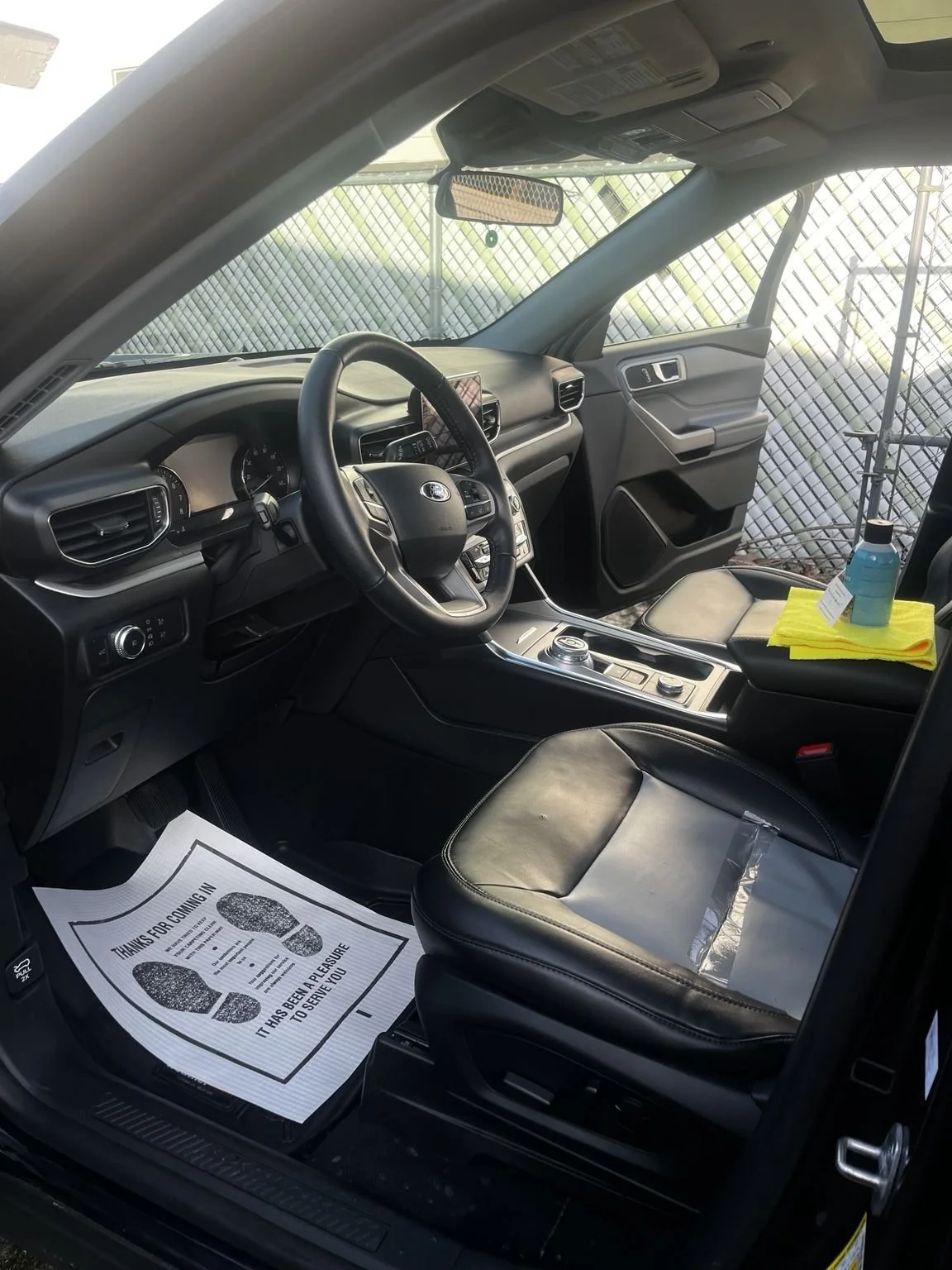 Ford Explorer interior detailing in Enumclaw WA - driver area, seat, dashboard, and floor fully deep cleaned by mobile detailing service.