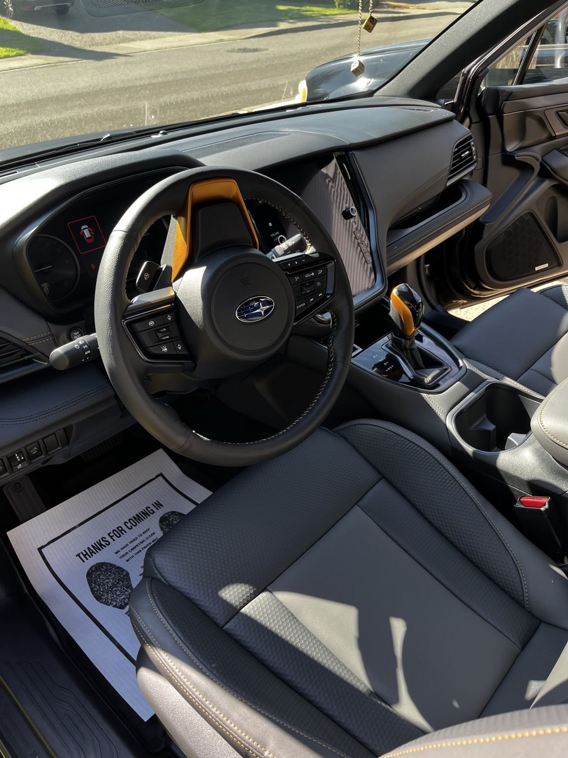Professional Subaru Outback interior detailing completed by Bryanz Auto Detailing in Covington, Wa with deep cleaned seats, dashboard, center console, and premium interior finish.
