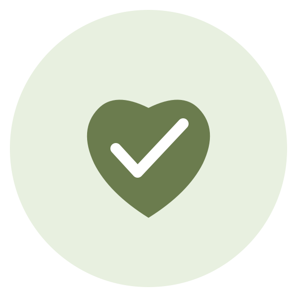 A green heart with a white check mark inside it.