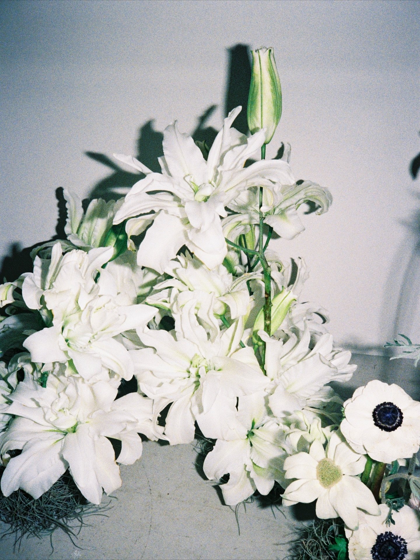 Pictures of a crowded work bench the night before Ann &amp; Mitch&rsquo;s wedding day 🪽🌙