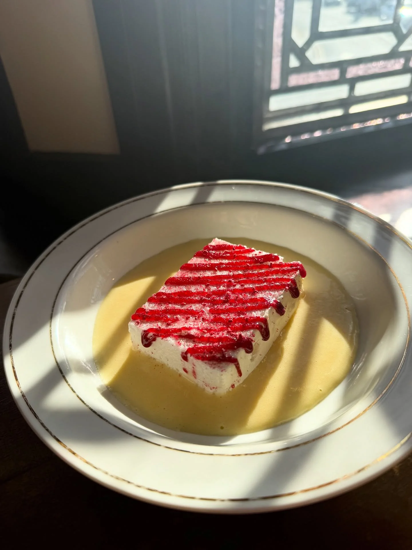 Sunday specials:

&icirc;le flottante - floating island, meringue, custard with damson and raspberry.

Devilled eggs.

A great start and end to our Sunday lunch offering.