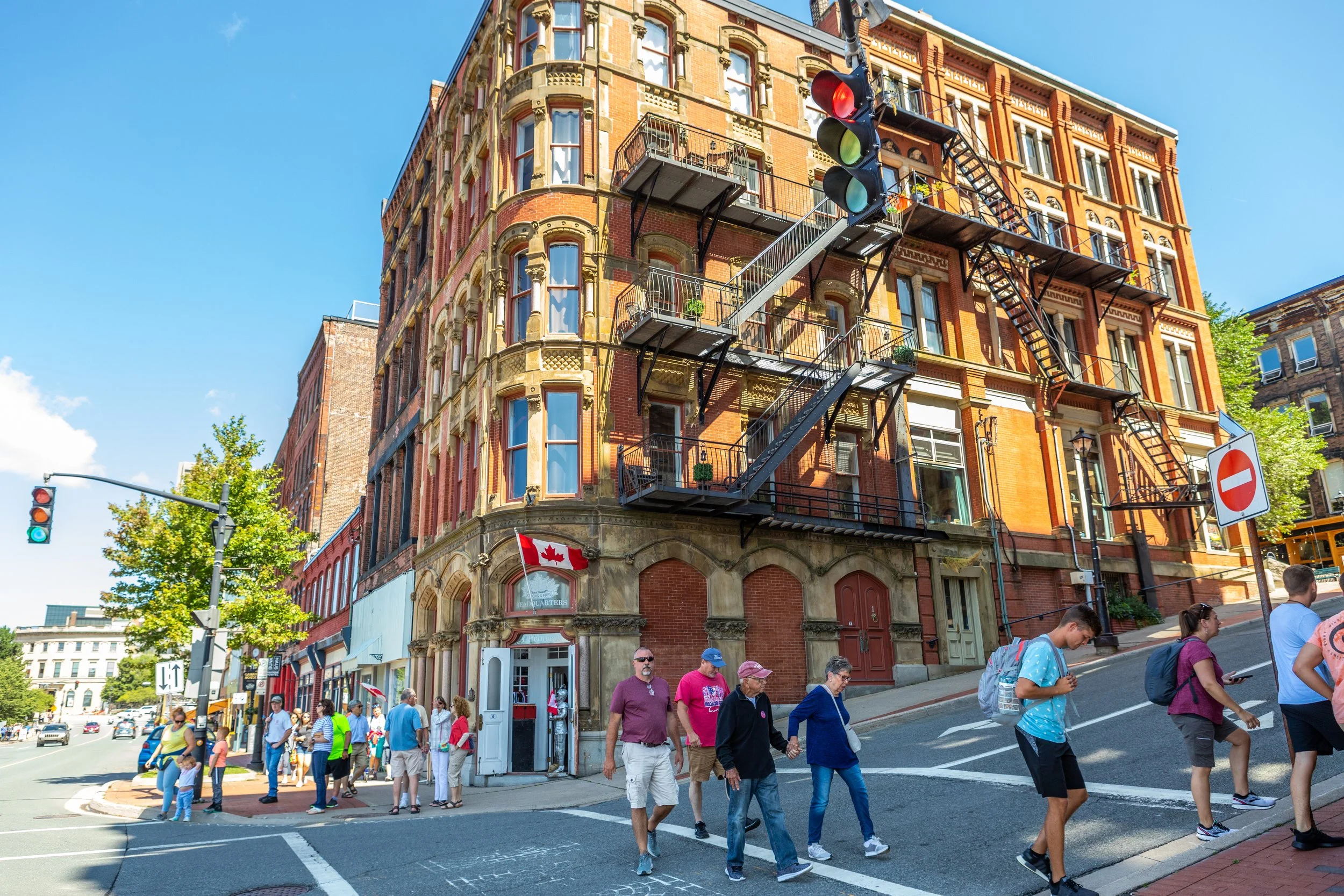 People walking around uptown Saint John buildings