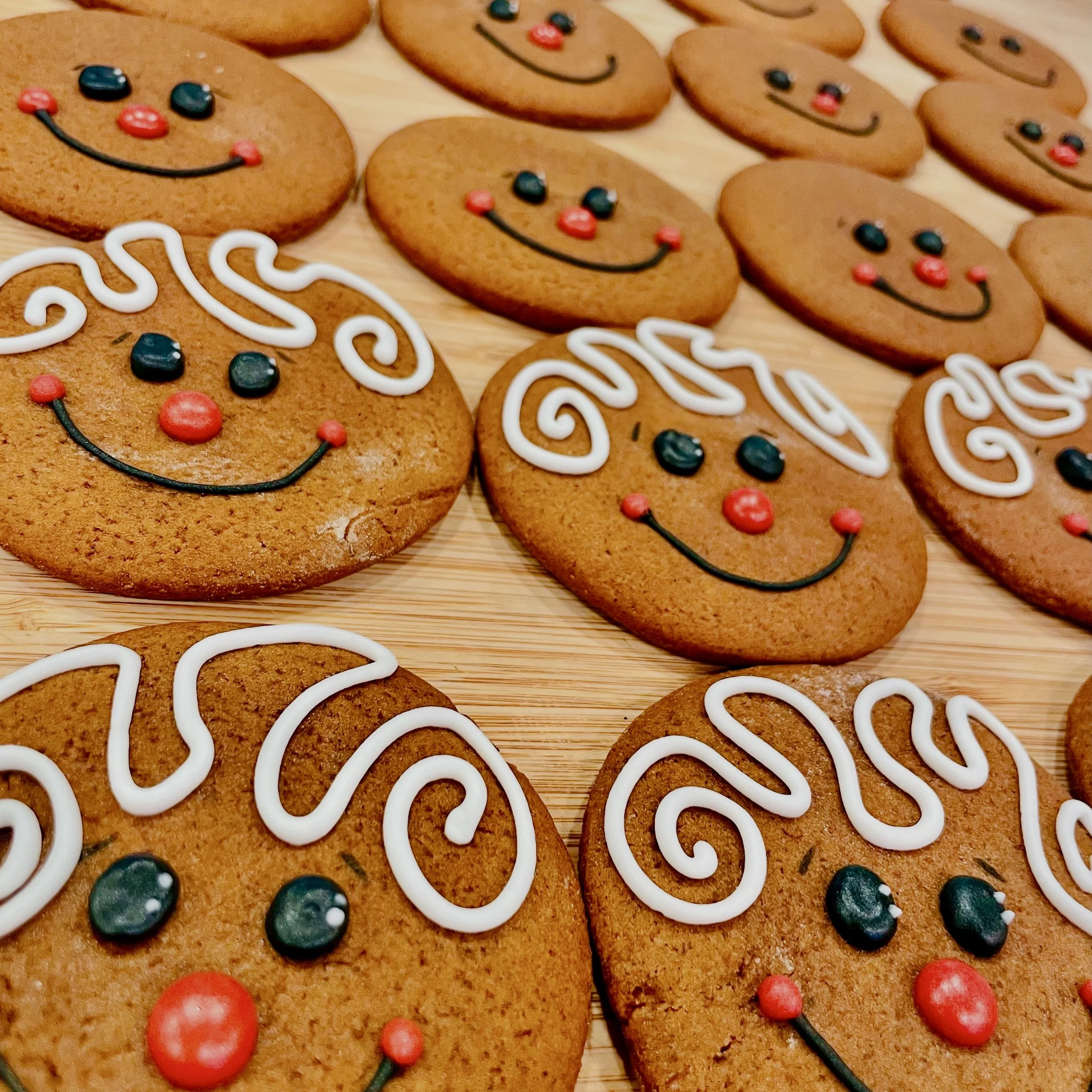 A Dozen Friendly Gingerbread Face Cookies