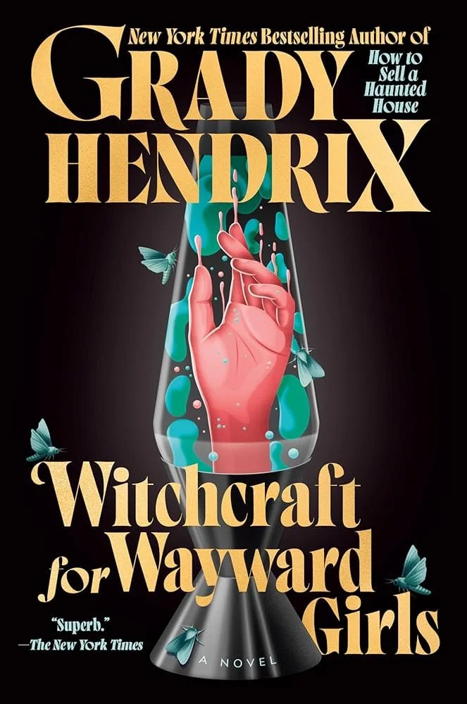 Book cover of 'Witchcraft for Wayward Girls' by Grady Hendrix, featuring a hand with pink skin inside a glass with blue-green swirls and butterflies, set against a black background with gold and light blue text.