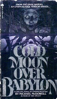 Dark cover with ghostly face and eerie trees, grayscale title text 'The Cold Moon Over Babylon' by Michael McDowell, with subtitle about a chilling novel of underground evil.