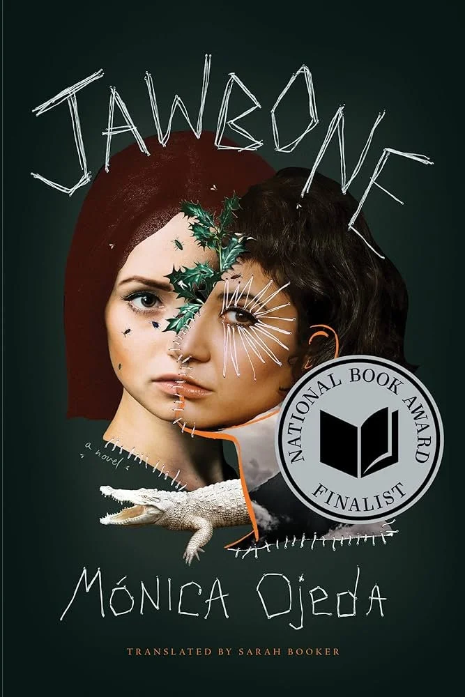 Book cover for 'Jade War' by Monica Ojeda, featuring a split image of a woman with face paint, holly leaves, and stitches, a lizard, and a badge indicating it's a National Book Award finalist.