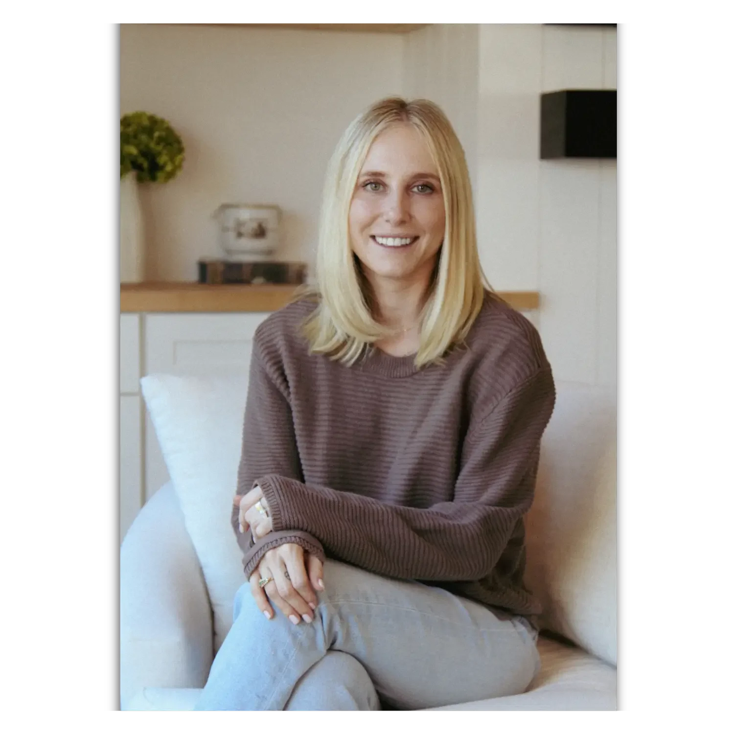 Lyle Wick sitting on a couch for a therapeutic mentorship session - Bridge The Gap