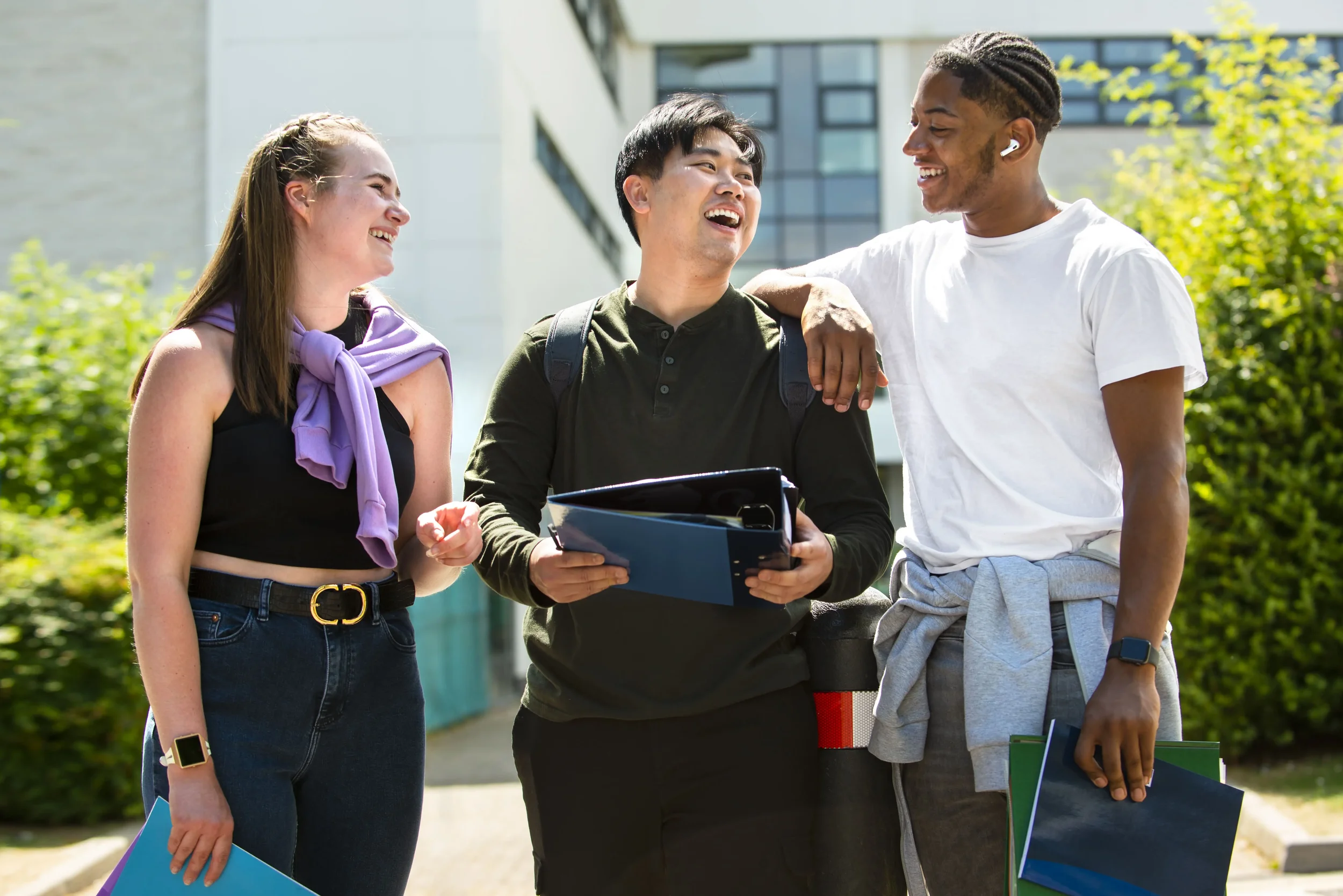 A group of students making friends in college - Bridge The Gap Services