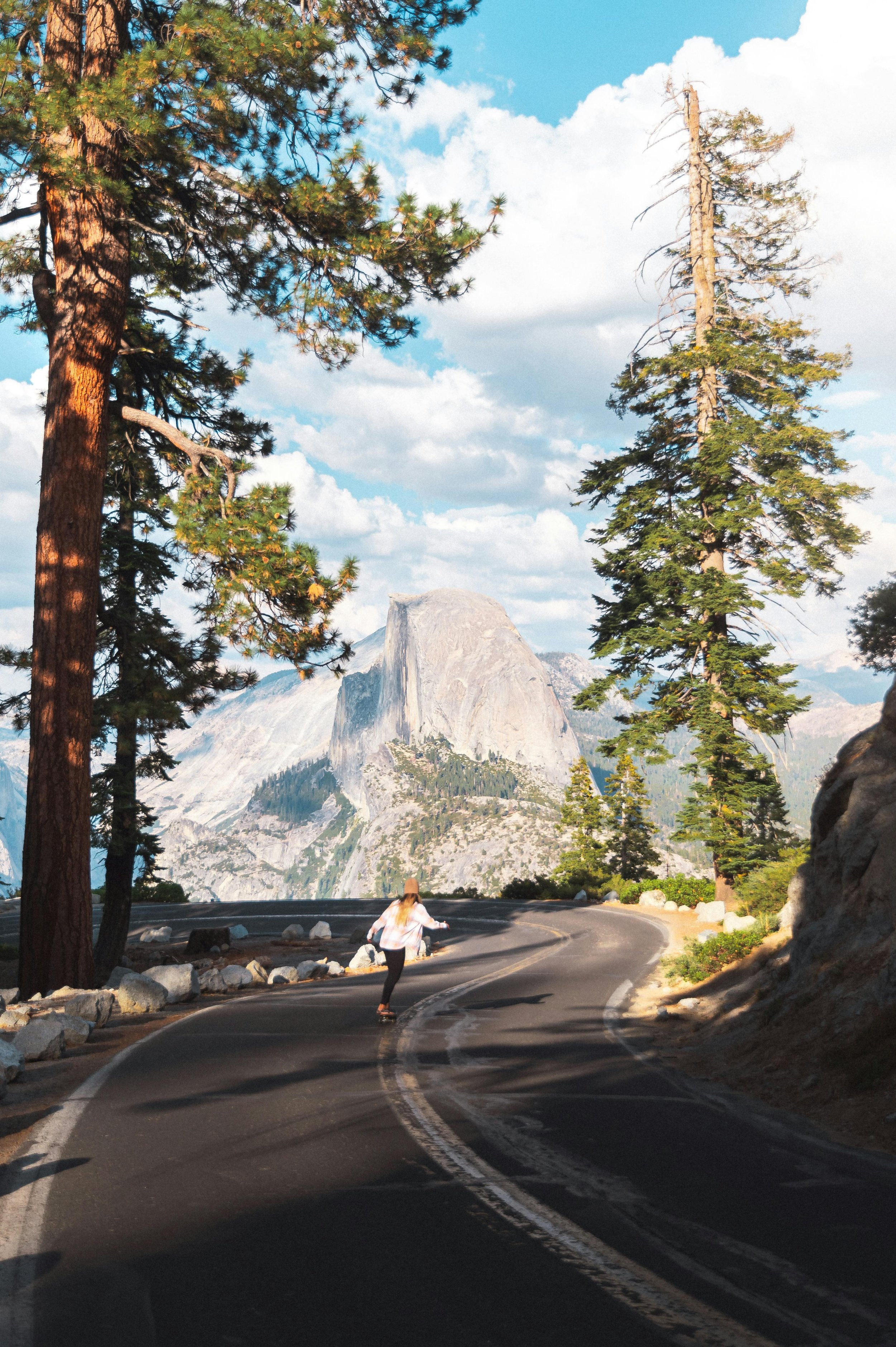 Sentinel Dome View: "Panoramic view from the top of Sentinel Dome, showcasing Yosemite’s breathtaking landscapes under a clear blue sky