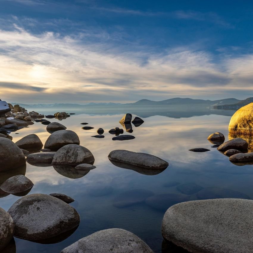 Golden Sunset Reflections on the Rocky Shoreline of Lake Tahoe.jpg