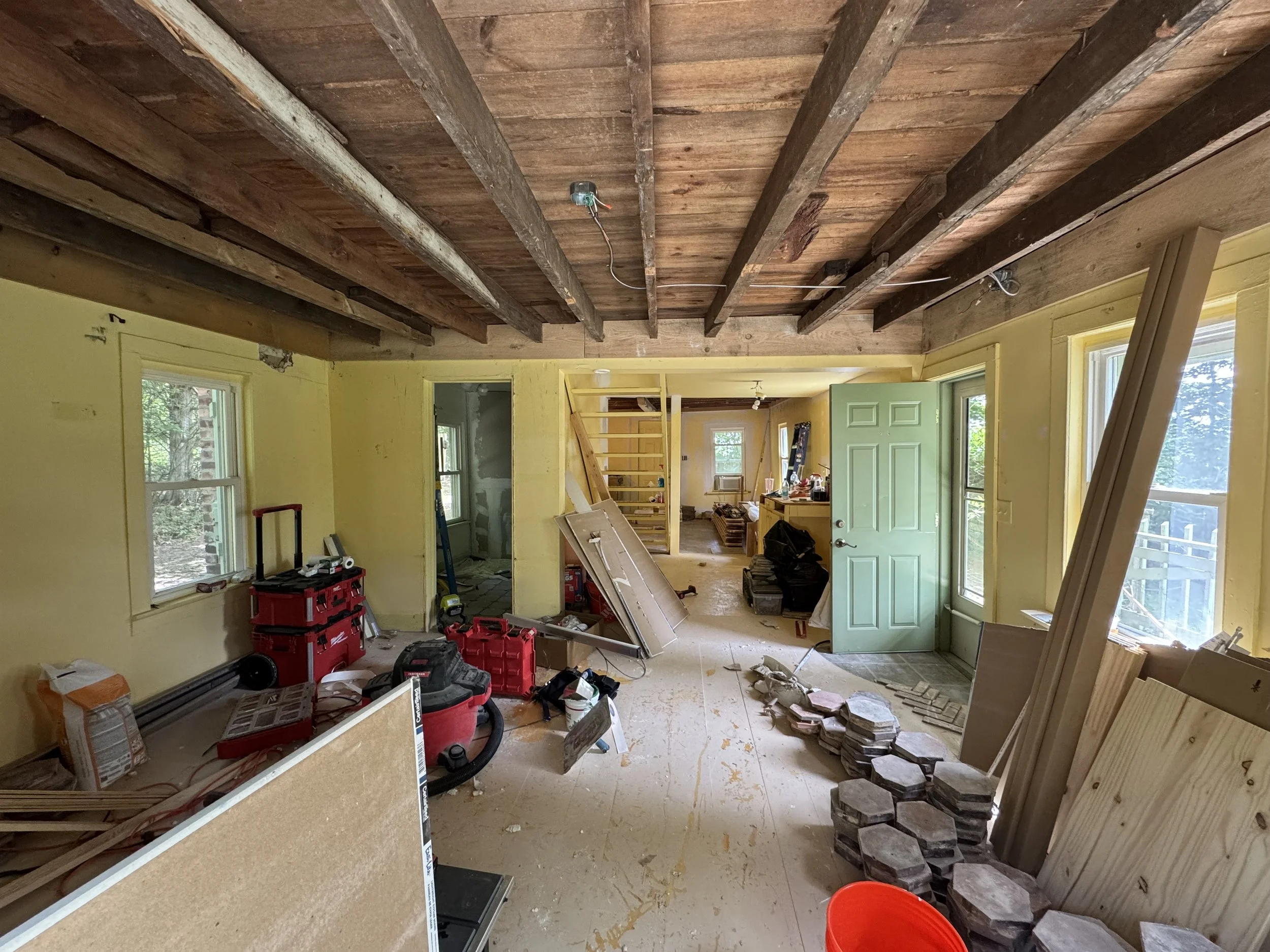 Chaos of mid-renovation; exposed ceiling
