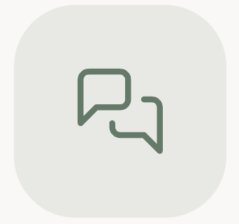 Icono de dos burbujas de diálogo entrelazadas en gris sobre fondo claro.